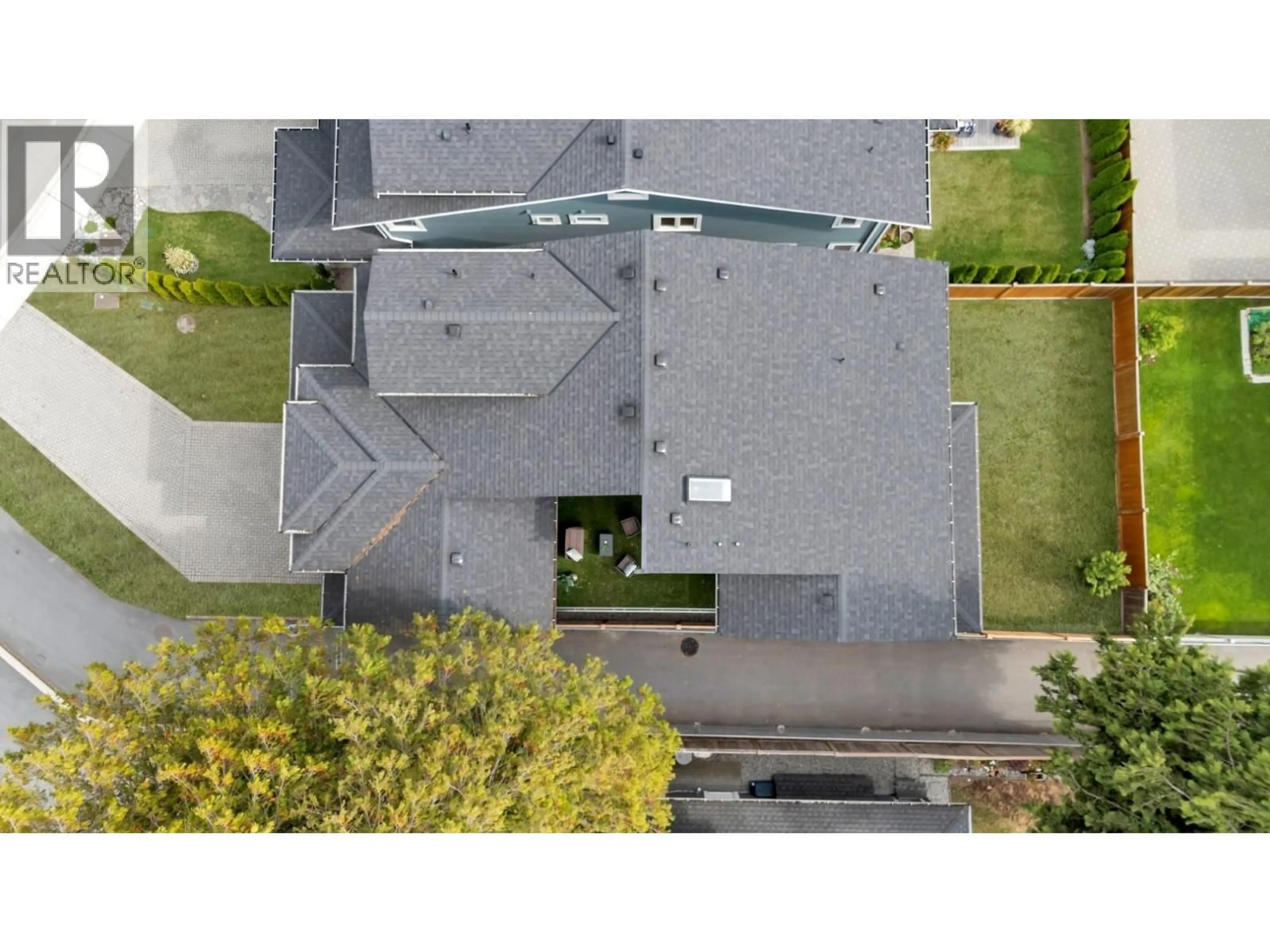 A pic from outside/outdoor area/front of a property/back of a property/a pic from drone, street for 5094A BENTLEY DRIVE, Ladner British Columbia V4K4J9