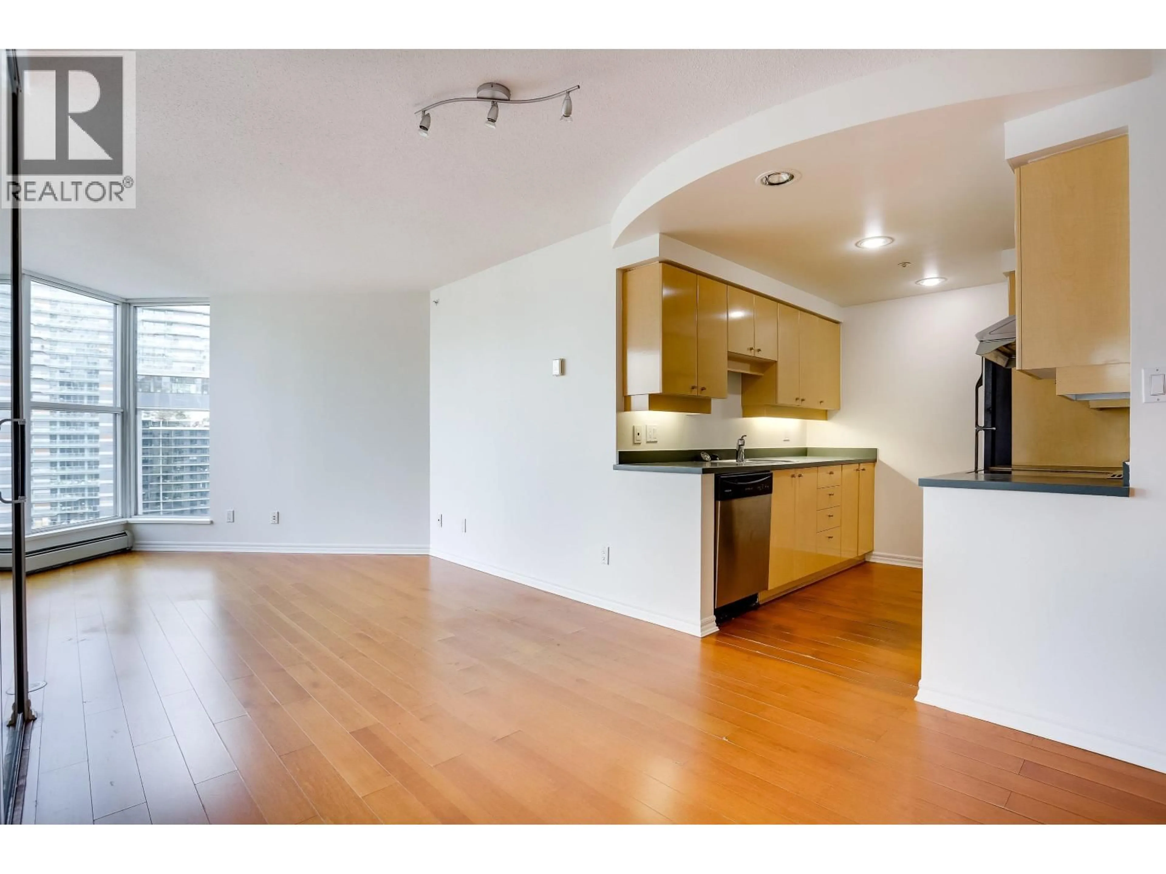 Open concept kitchen, wood/laminate floor for 2008 - 1009 EXPO BOULEVARD, Vancouver British Columbia V6Z2V9