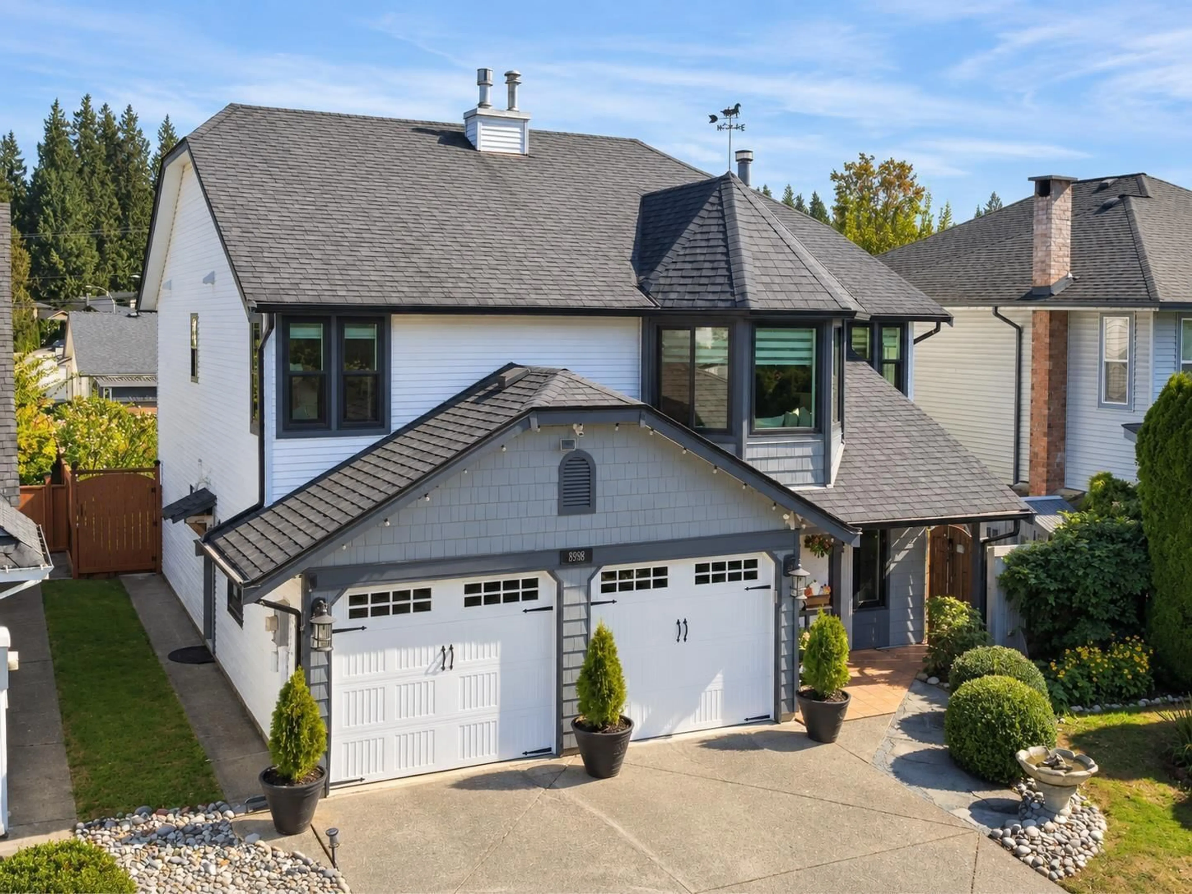 A pic from outside/outdoor area/front of a property/back of a property/a pic from drone, street for 8998 203B STREET, Langley British Columbia V1M1Y6