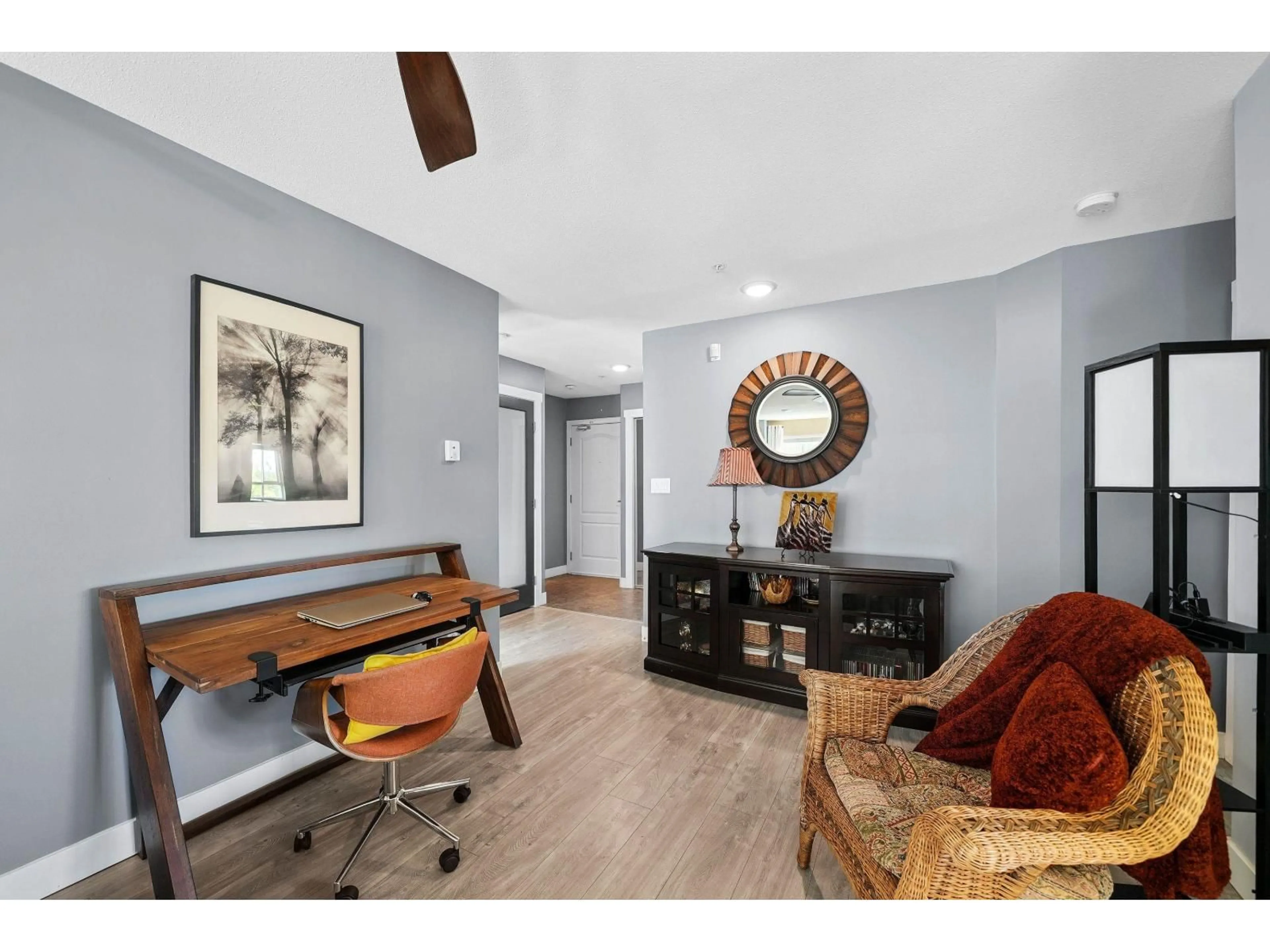 Living room with furniture, wood/laminate floor for 406 - 22022 49 AVENUE, Langley British Columbia V3A3R9
