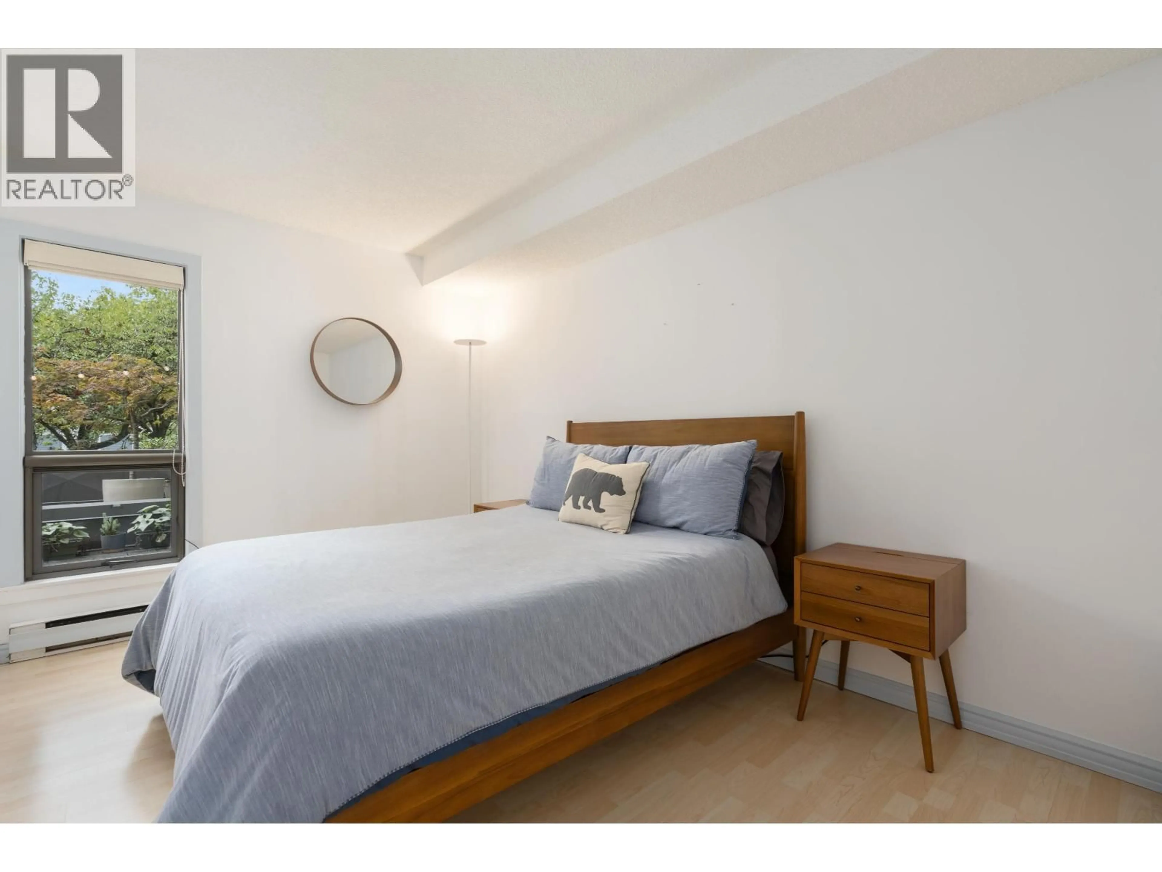 Bedroom with bed, unknown for 106 - 1477 FOUNTAIN WAY, Vancouver British Columbia V6H3W9