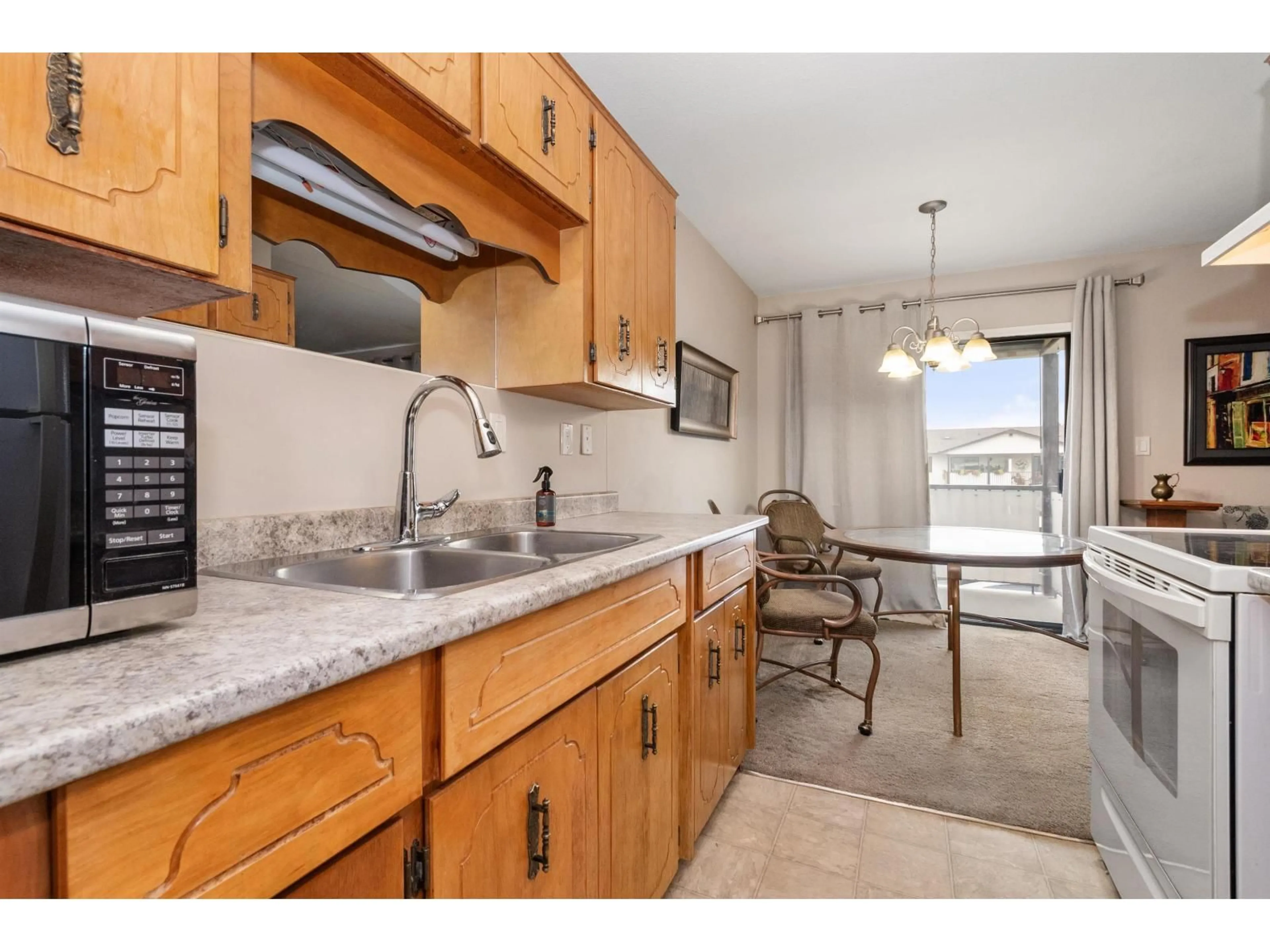 Standard kitchen, ceramic/tile floor for 58 - 7455 HURON STREET, Chilliwack British Columbia V2R3T9