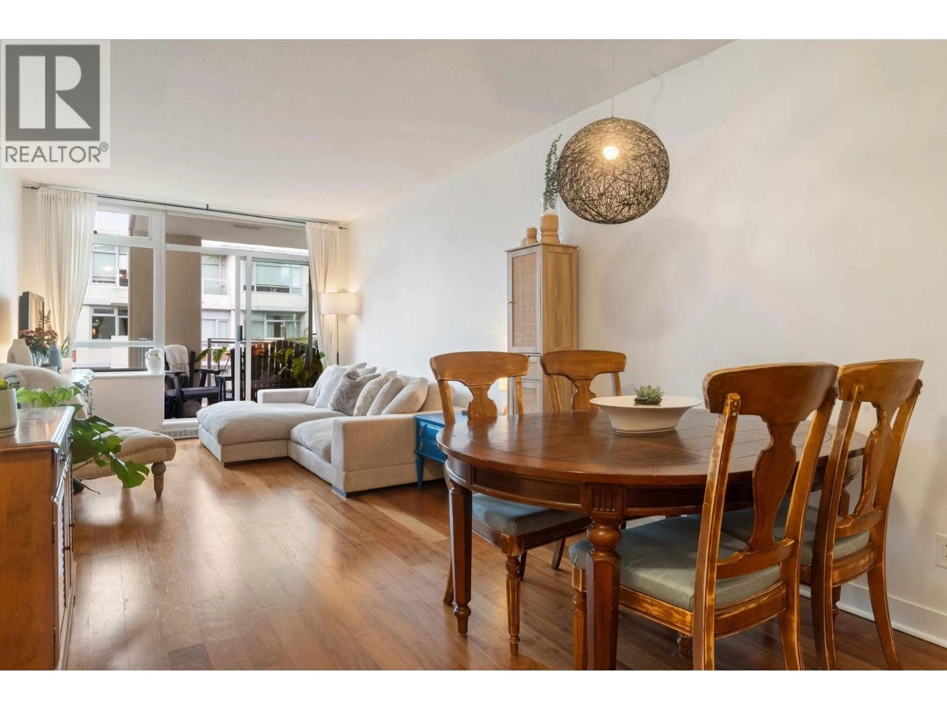 Dining room, wood/laminate floor for 608 - 2228 BROADWAY, Vancouver British Columbia V6K0B1