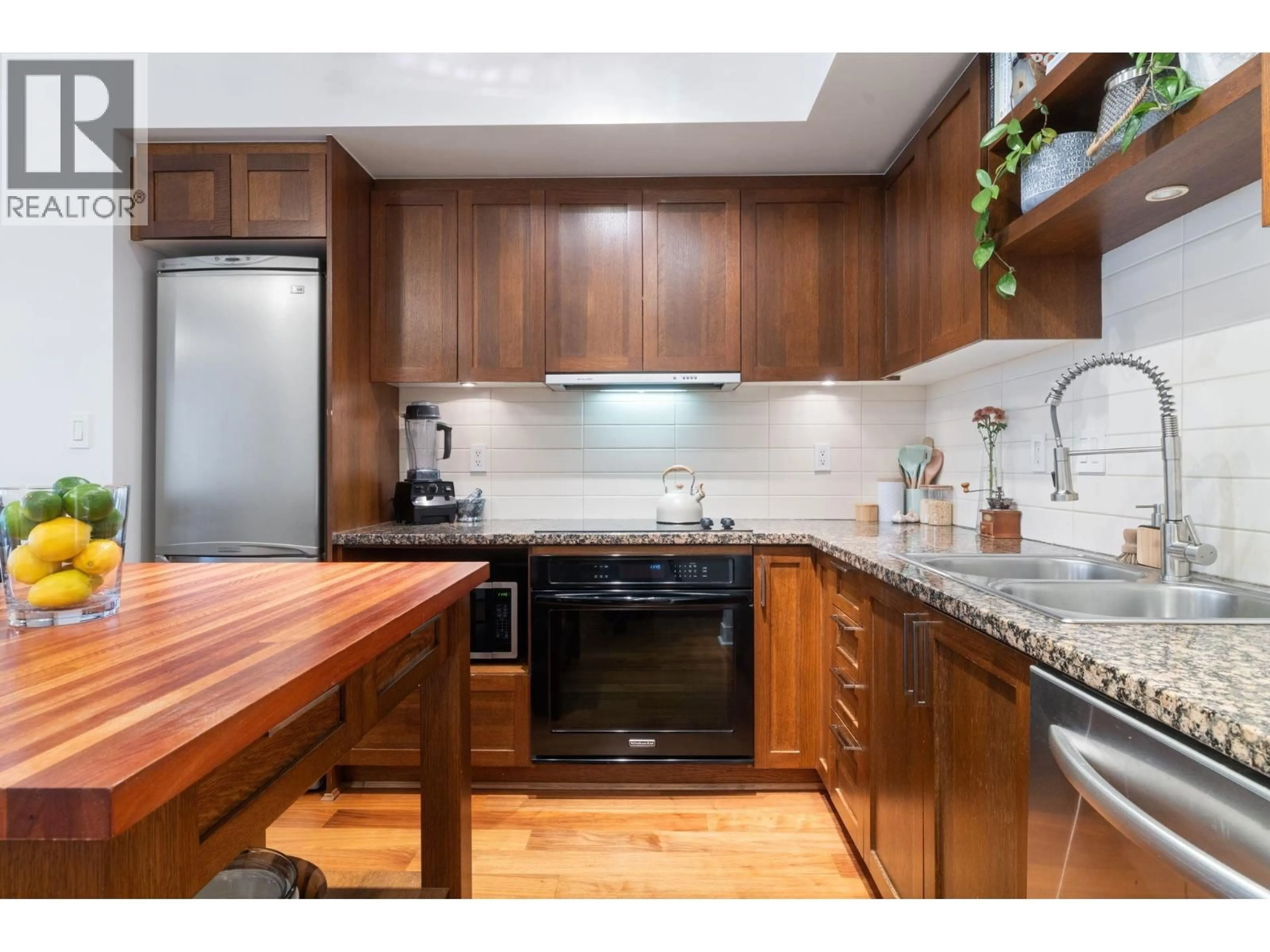 Standard kitchen, wood/laminate floor for 608 - 2228 BROADWAY, Vancouver British Columbia V6K0B1