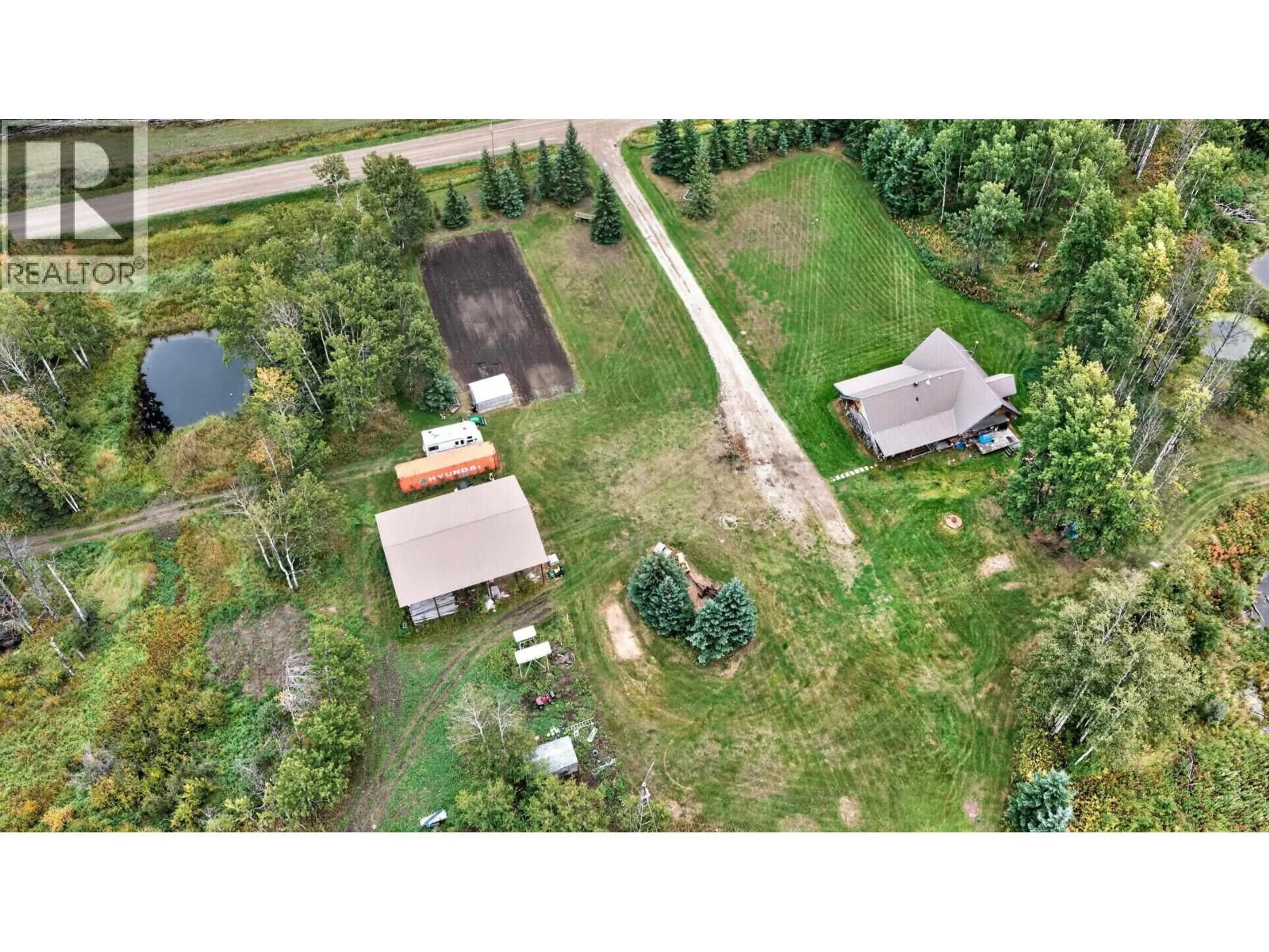 A pic from outside/outdoor area/front of a property/back of a property/a pic from drone, unknown for 15708 267 ROAD, Fort St. John British Columbia V0C1Y0