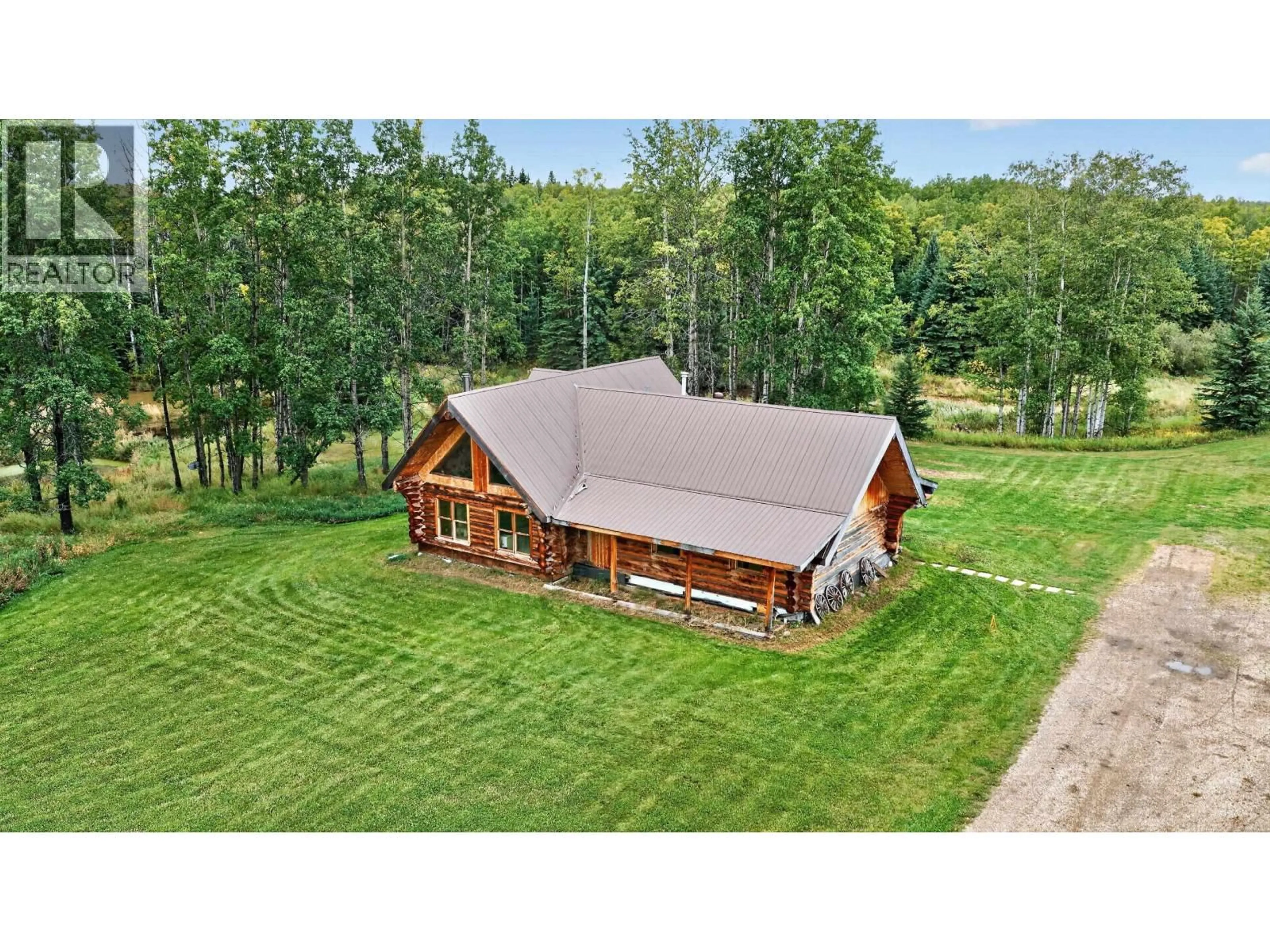 A pic from outside/outdoor area/front of a property/back of a property/a pic from drone, building for 15708 267 ROAD, Fort St. John British Columbia V0C1Y0