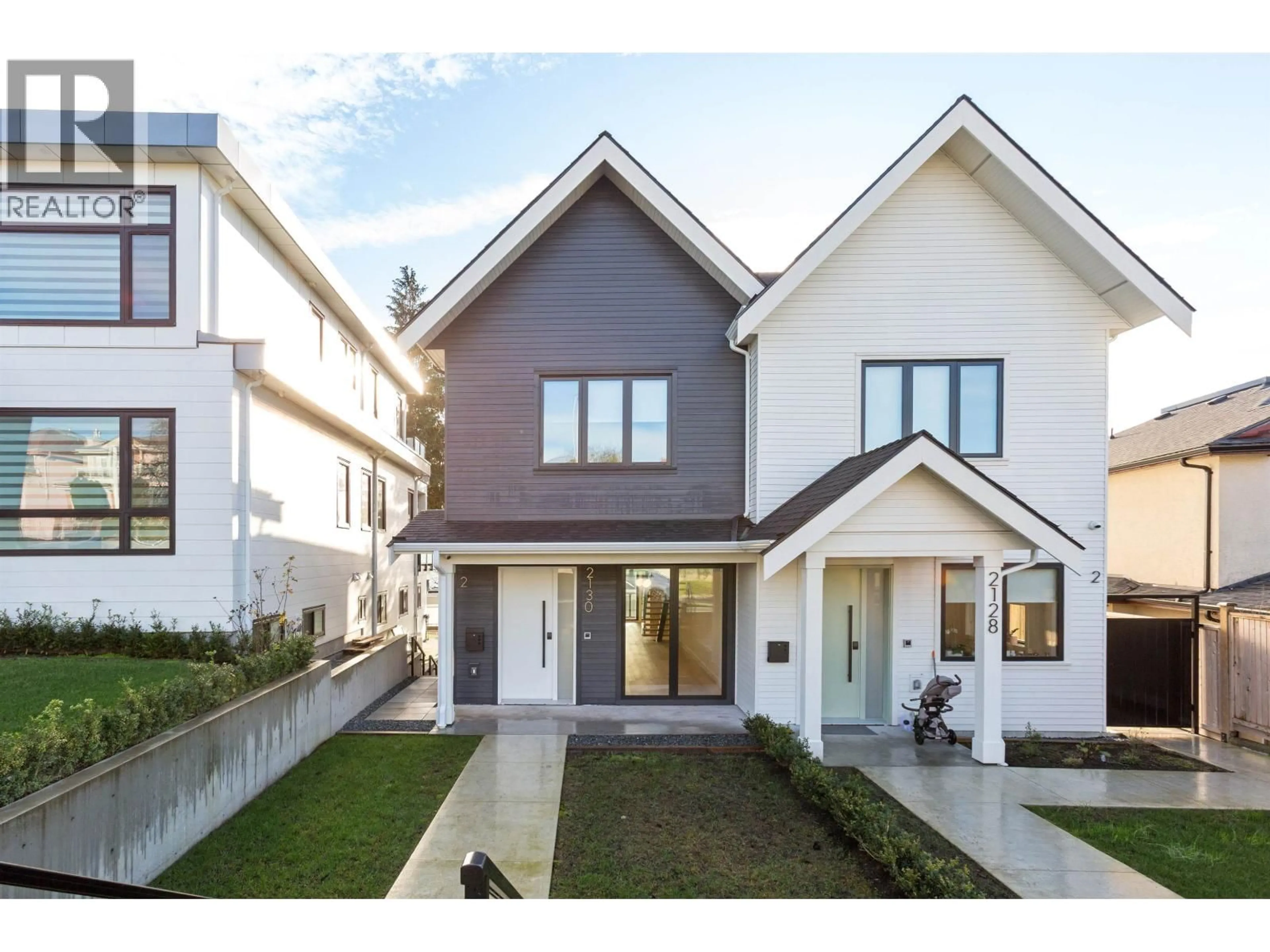 Home with vinyl exterior material, street for 2130 QUALICUM DRIVE, Vancouver British Columbia V5P2M2