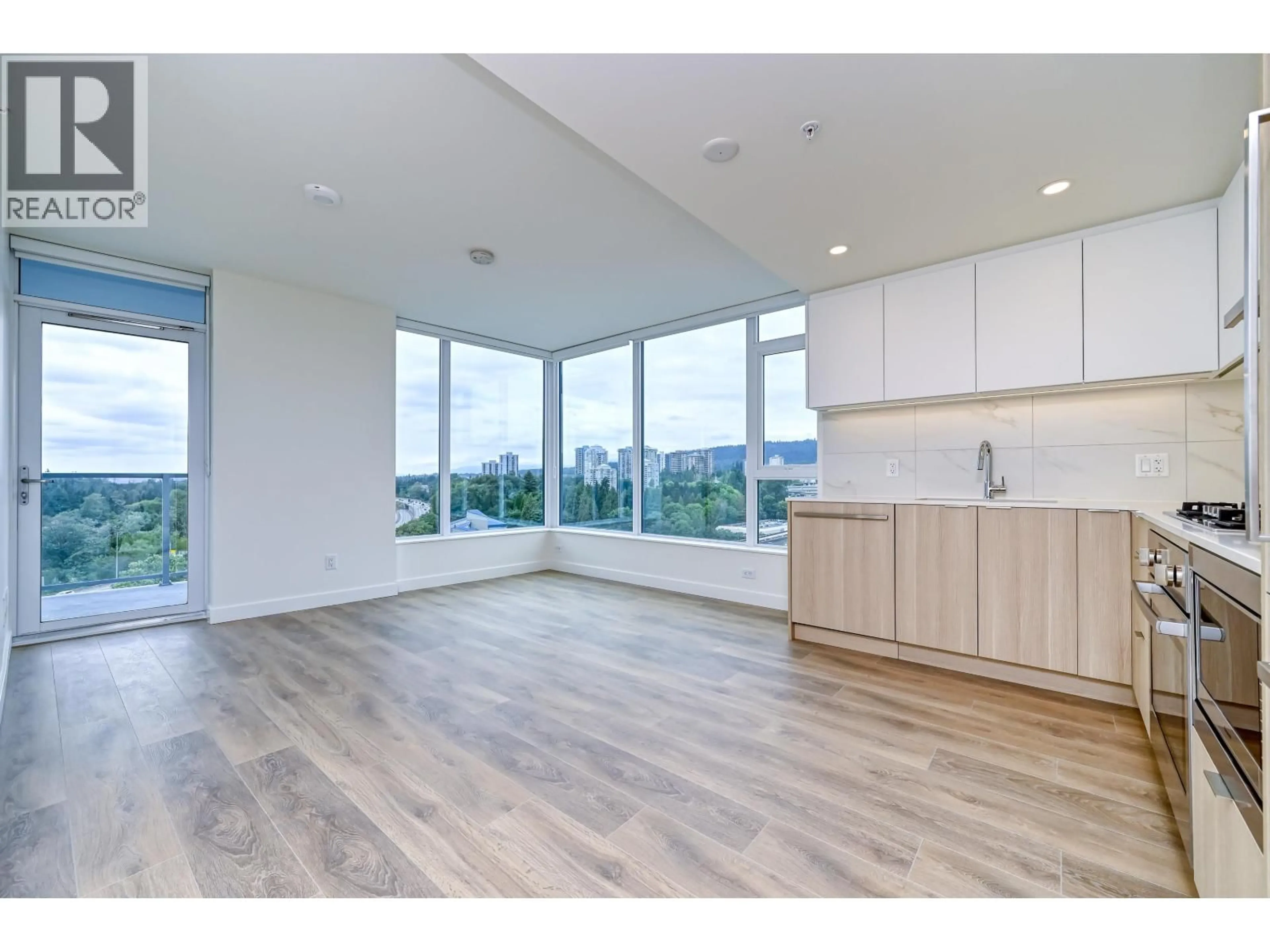 Open concept kitchen, wood/laminate floor for 1009 - 318 ALDERSON AVENUE, Coquitlam British Columbia V3K0J1