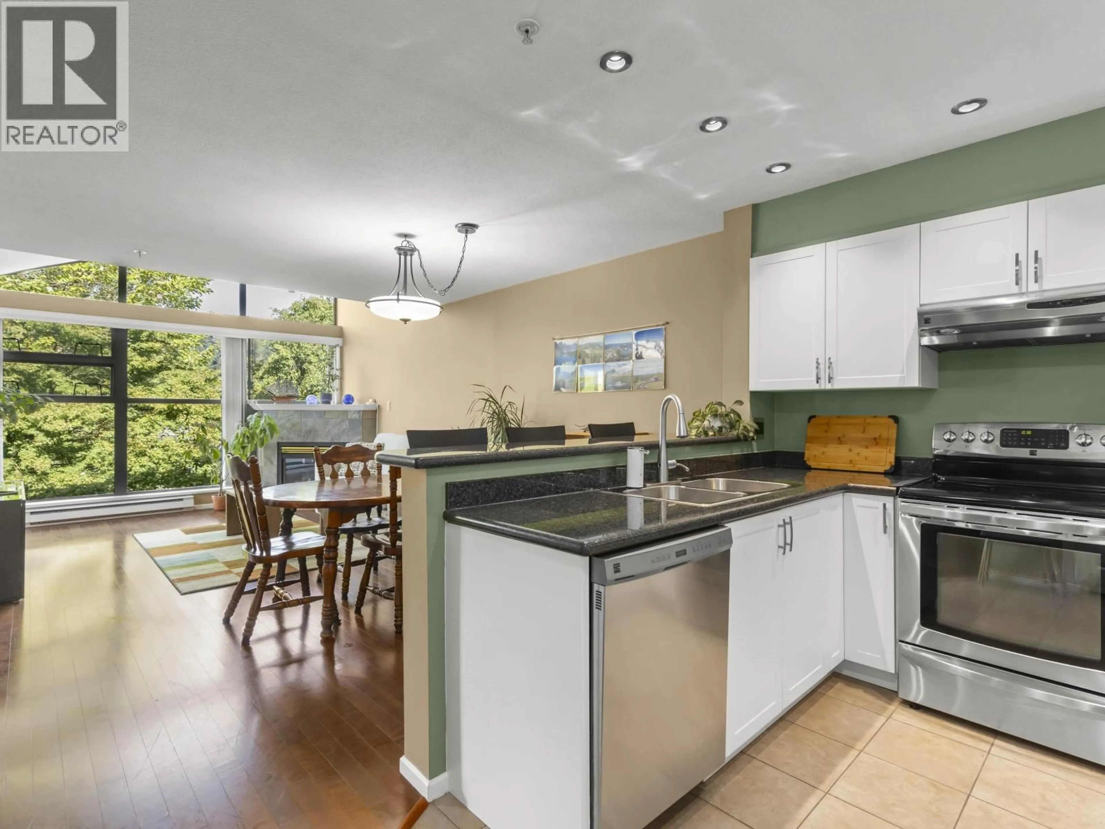 Open concept kitchen, ceramic/tile floor for 408 - 225 NEWPORT DRIVE, Port Moody British Columbia V3H5C7
