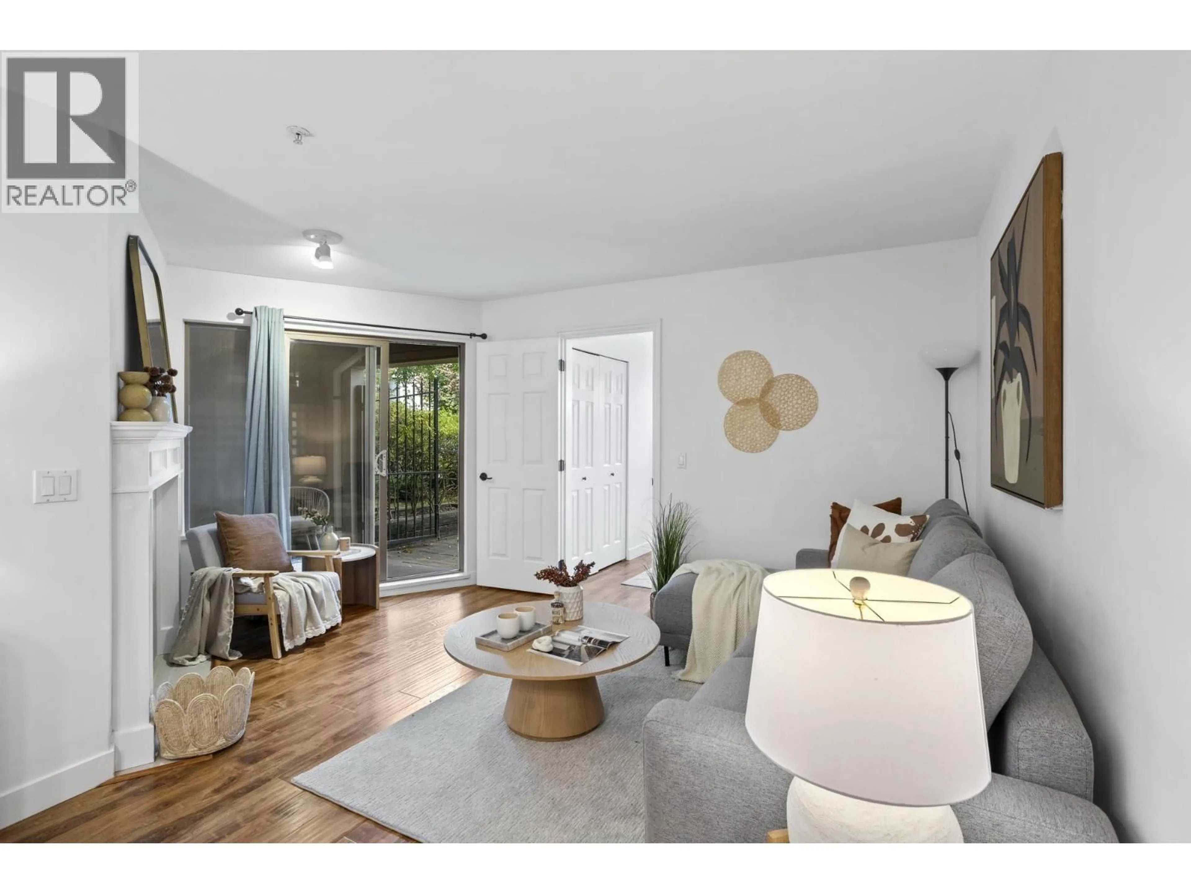 Living room with furniture, wood/laminate floor for 104 - 688 16TH AVENUE, Vancouver British Columbia V5T2V4