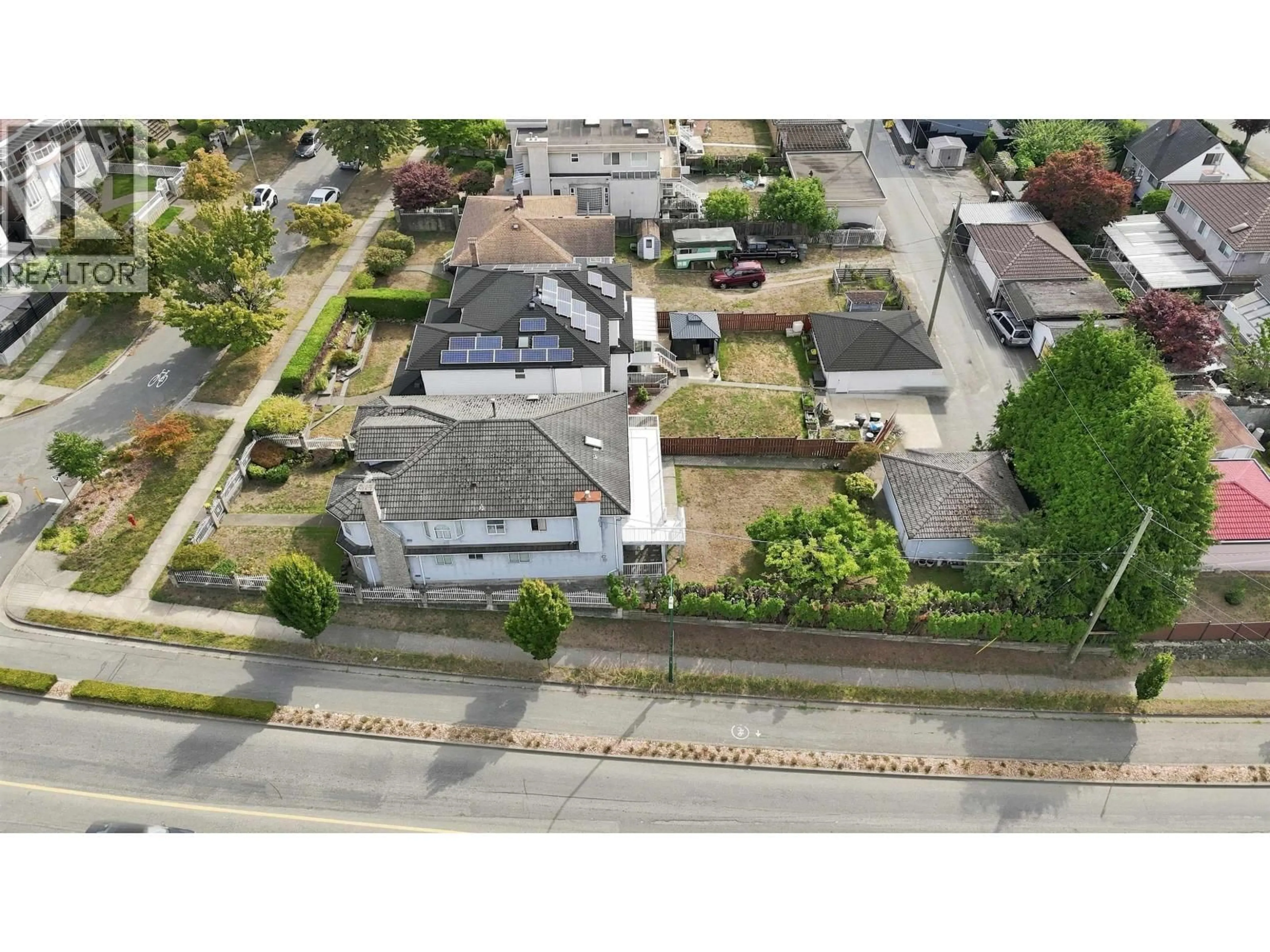 A pic from outside/outdoor area/front of a property/back of a property/a pic from drone, street for 1708 PRESTWICK DRIVE, Vancouver British Columbia V5P2E6
