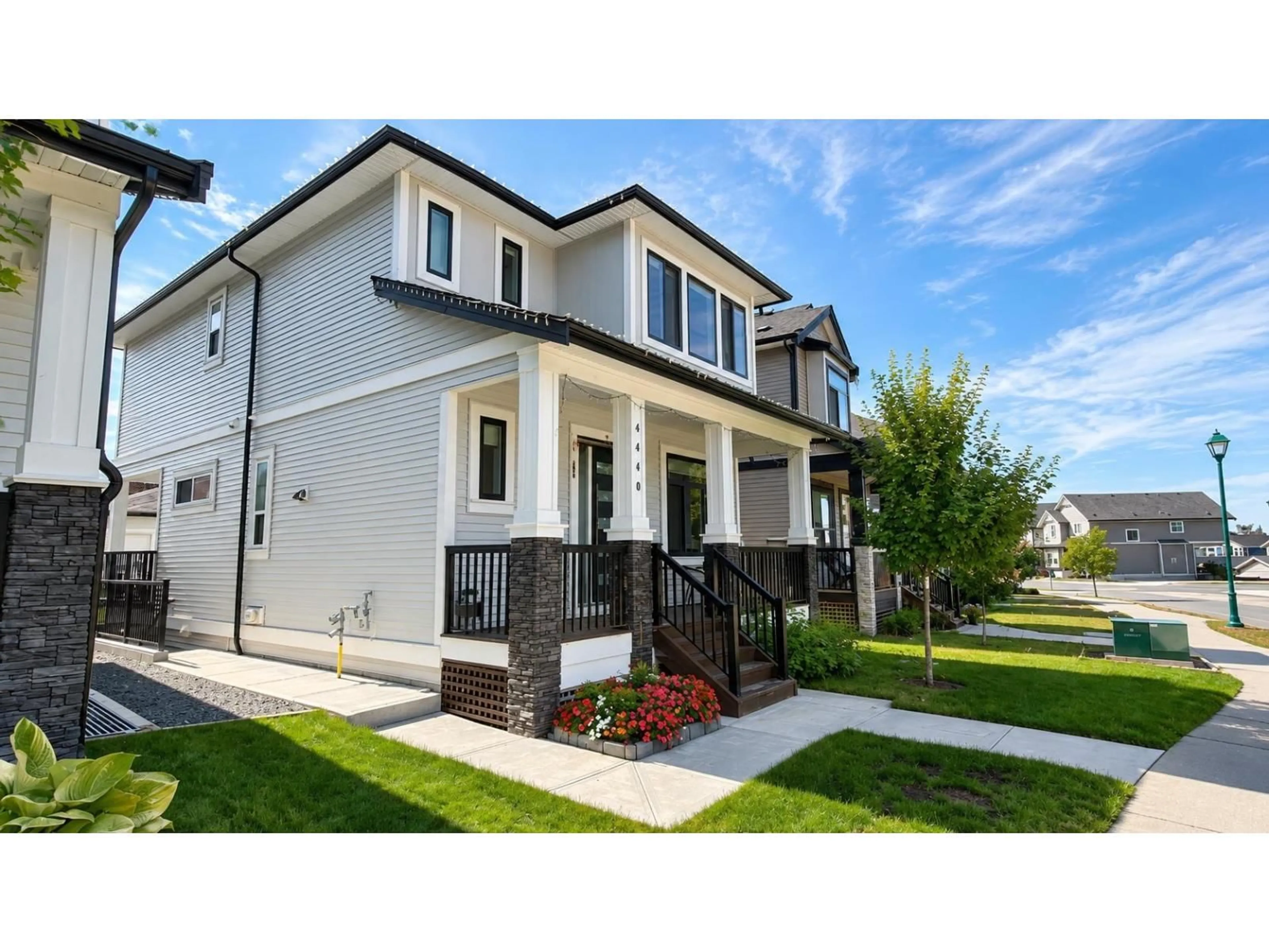 Home with vinyl exterior material, street for 4440 STEPHEN LEACOCK DRIVE, Abbotsford British Columbia V3G0H6