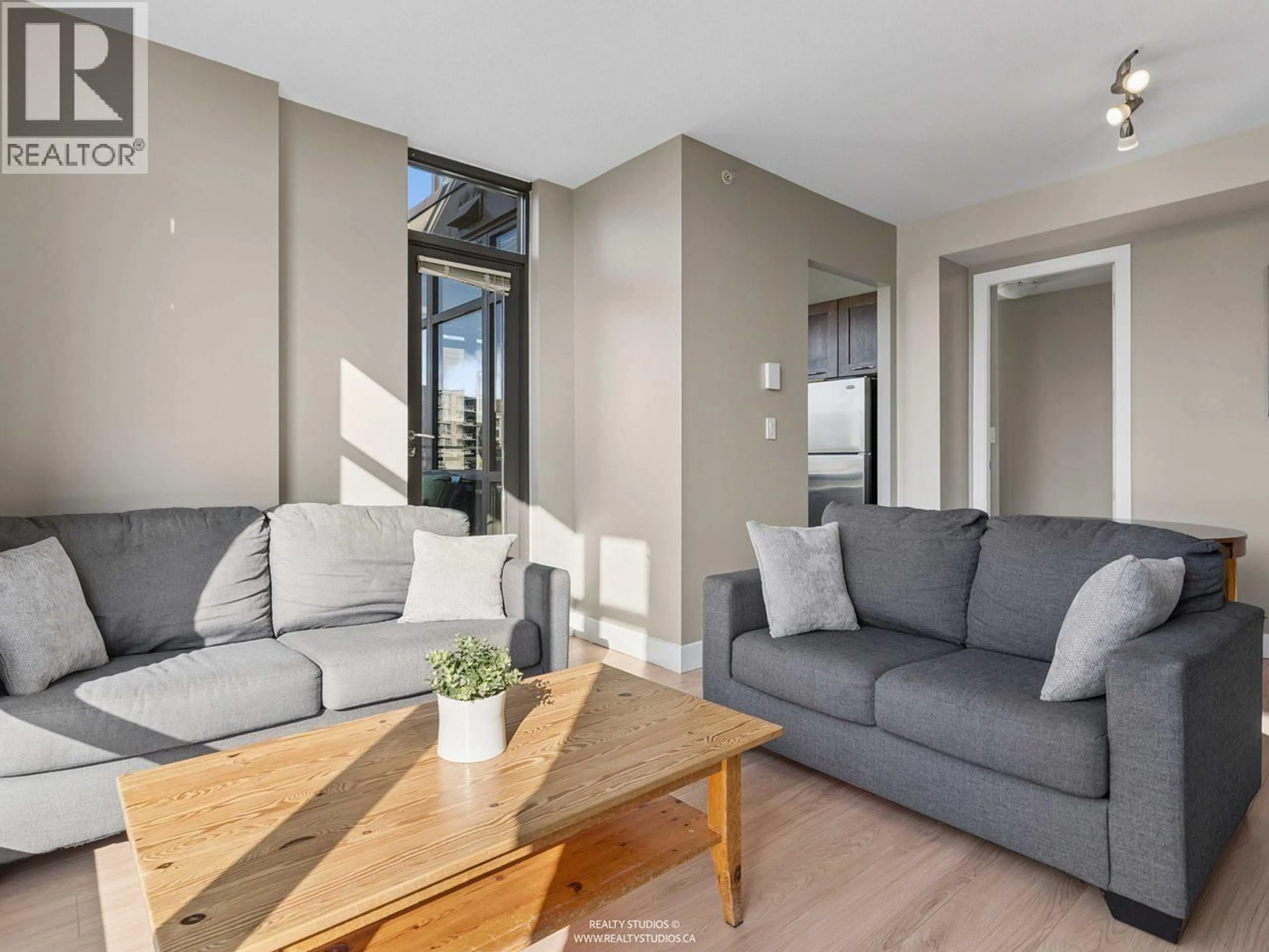 Living room with furniture, unknown for 901 - 9300 UNIVERSITY CRESCENT, Burnaby British Columbia V5A4X9