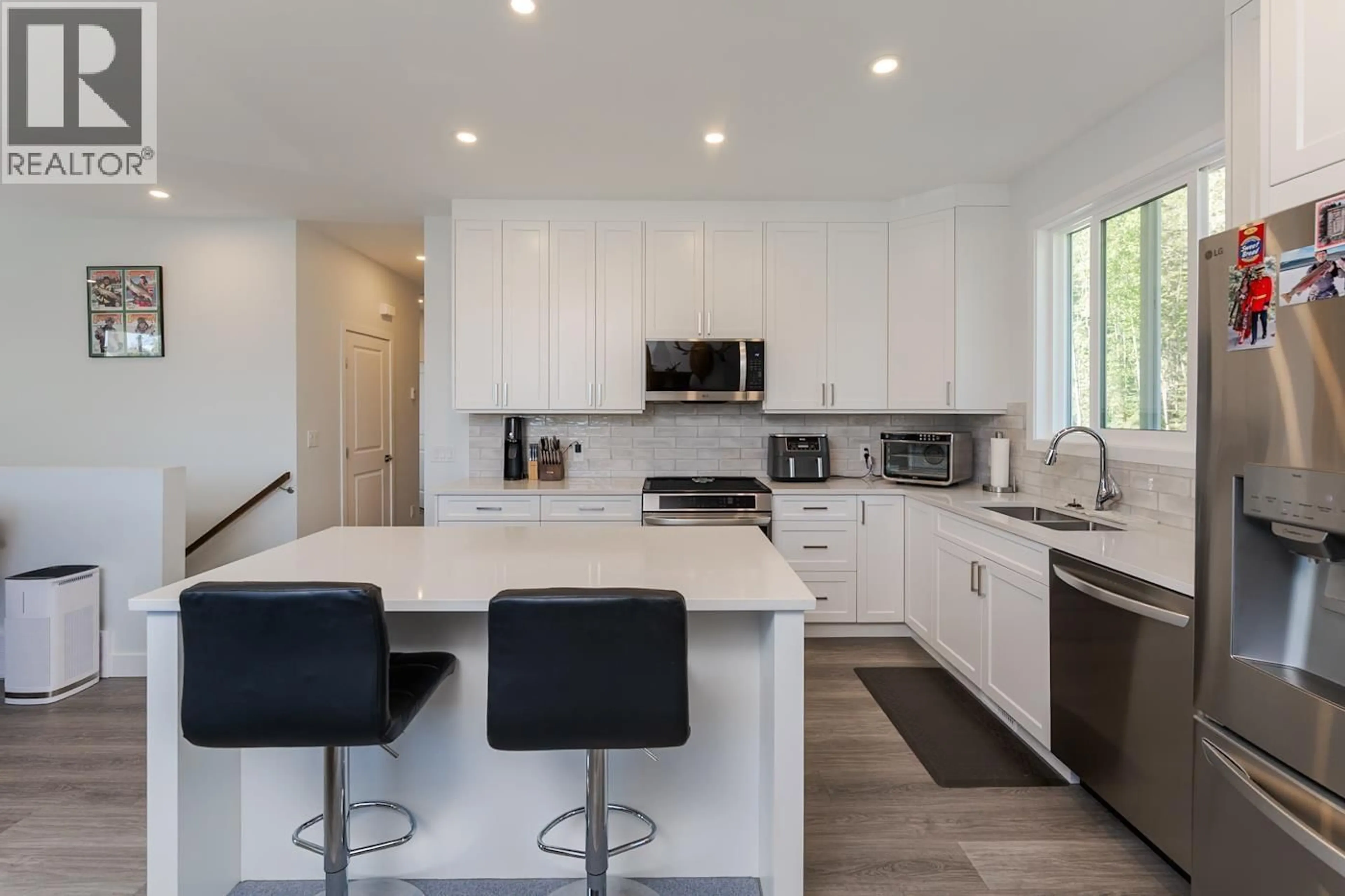 Open concept kitchen, ceramic/tile floor for 7124 HILLU ROAD, Prince George British Columbia V2K0B4