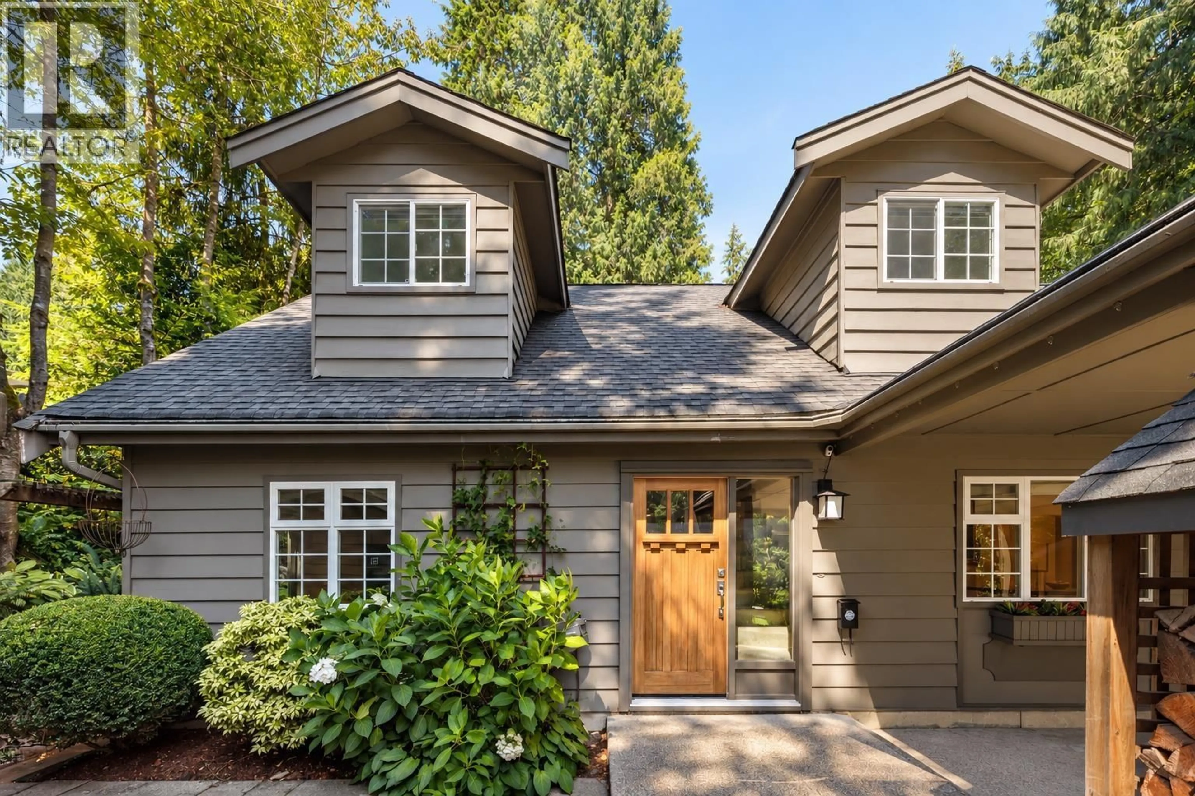 Home with vinyl exterior material, street for 1458 KILMER ROAD, North Vancouver British Columbia V7K1R2