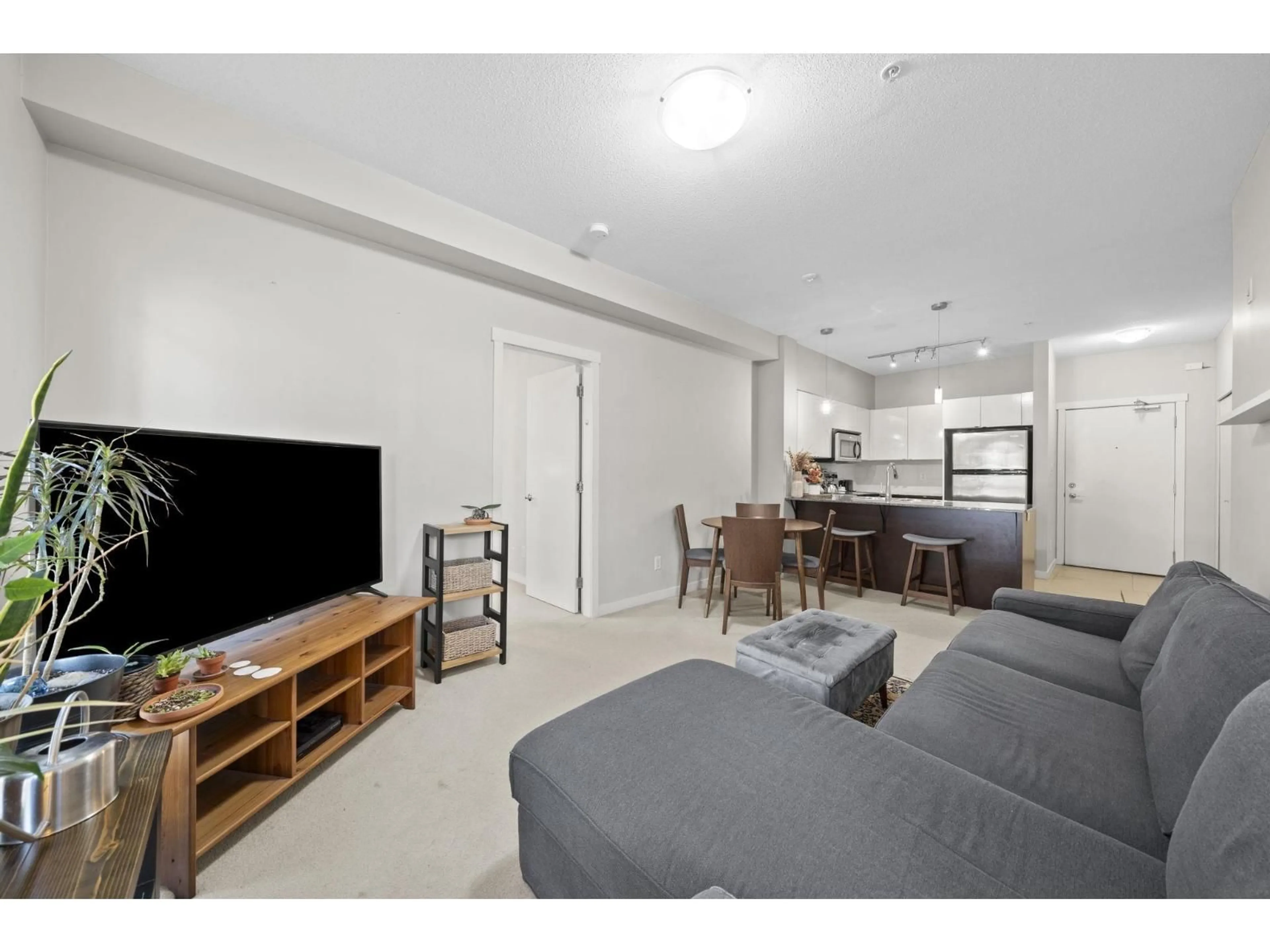 Living room with furniture, unknown for 216 - 13733 107A AVENUE, Surrey British Columbia V3T0B7