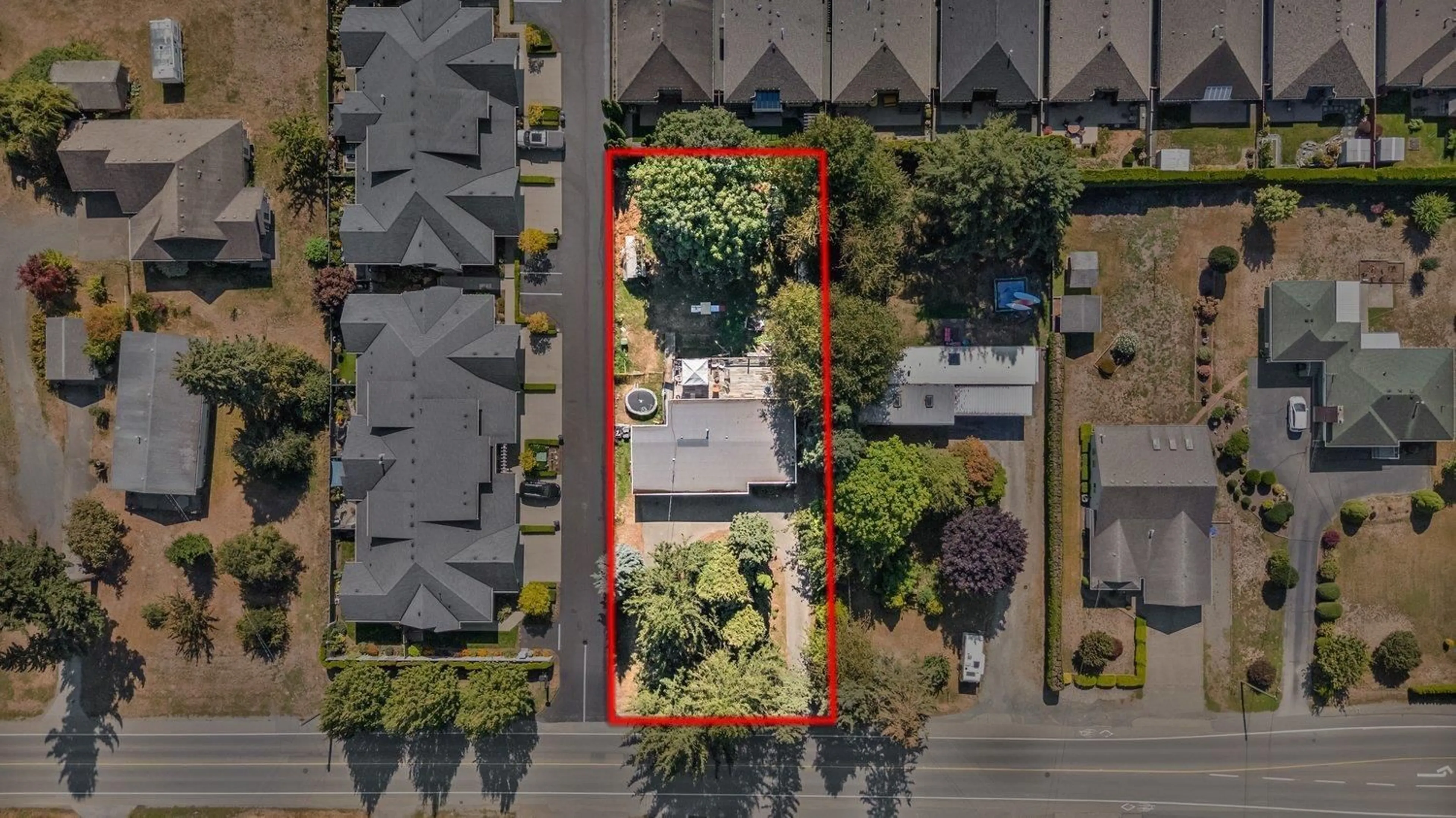 A pic from outside/outdoor area/front of a property/back of a property/a pic from drone, street for 44850 KEITH WILSON ROAD, Chilliwack British Columbia V2R3J9
