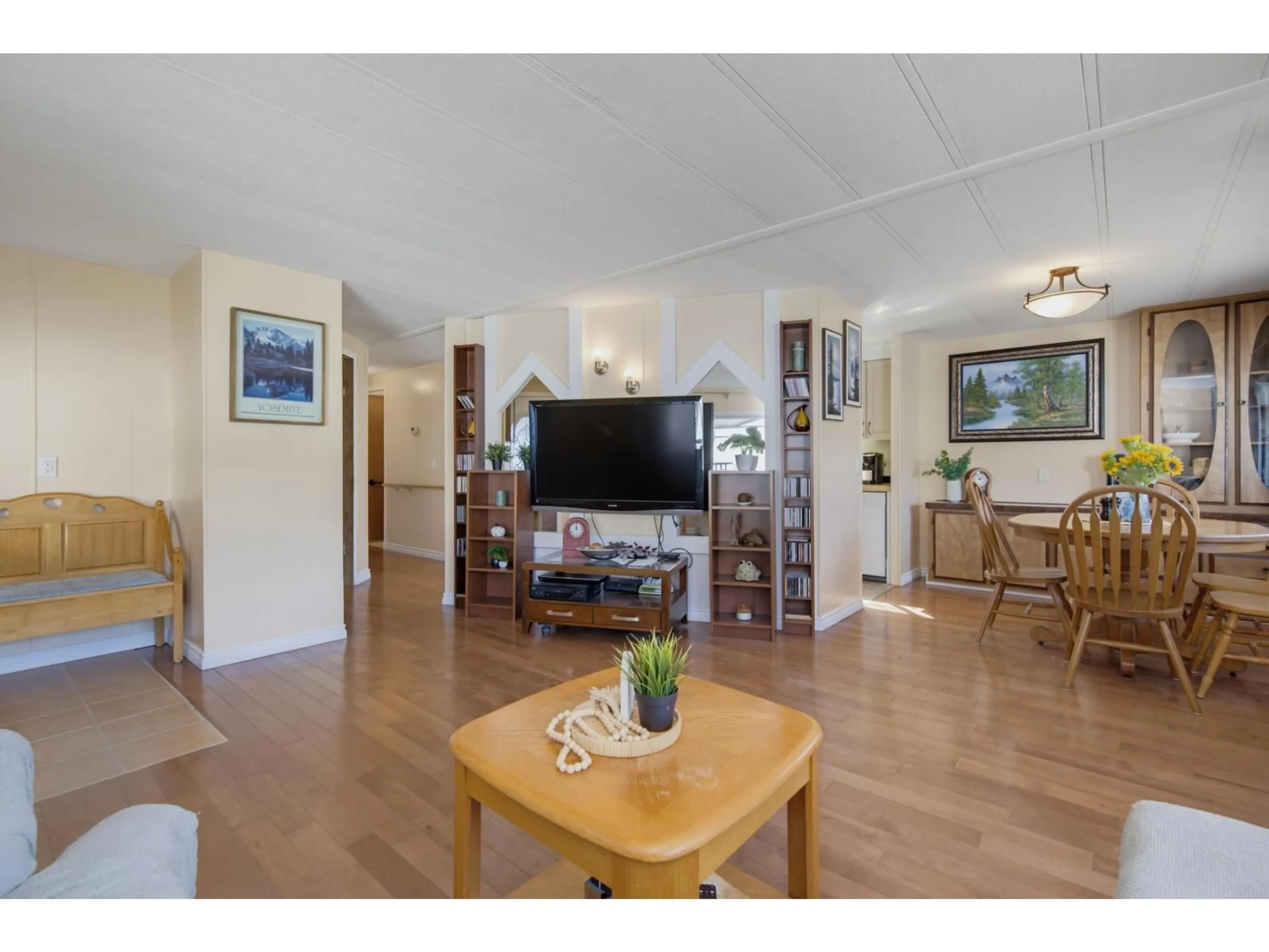 Living room with furniture, wood/laminate floor for 23 - 2270 196 STREET, Langley British Columbia V2Z1N6