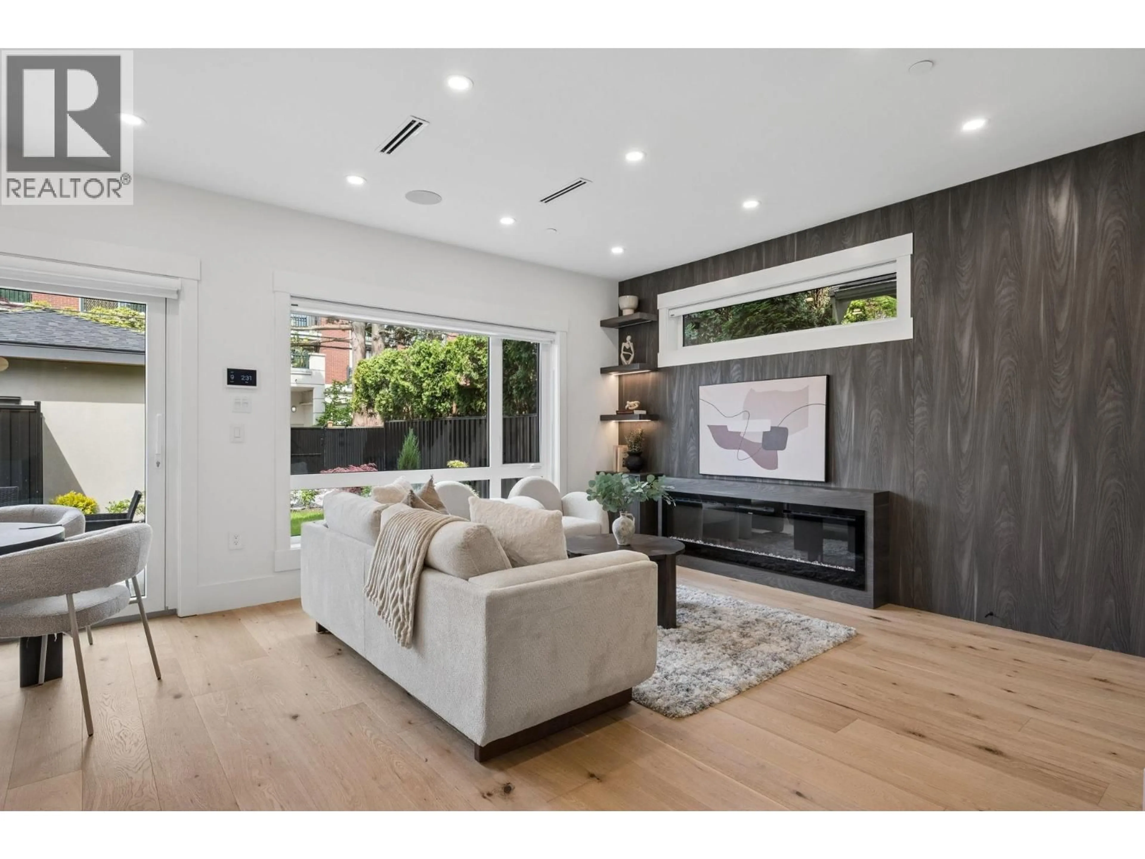 Living room with furniture, wood/laminate floor for 2 - 4549 11TH AVENUE, Vancouver British Columbia V6R2M5