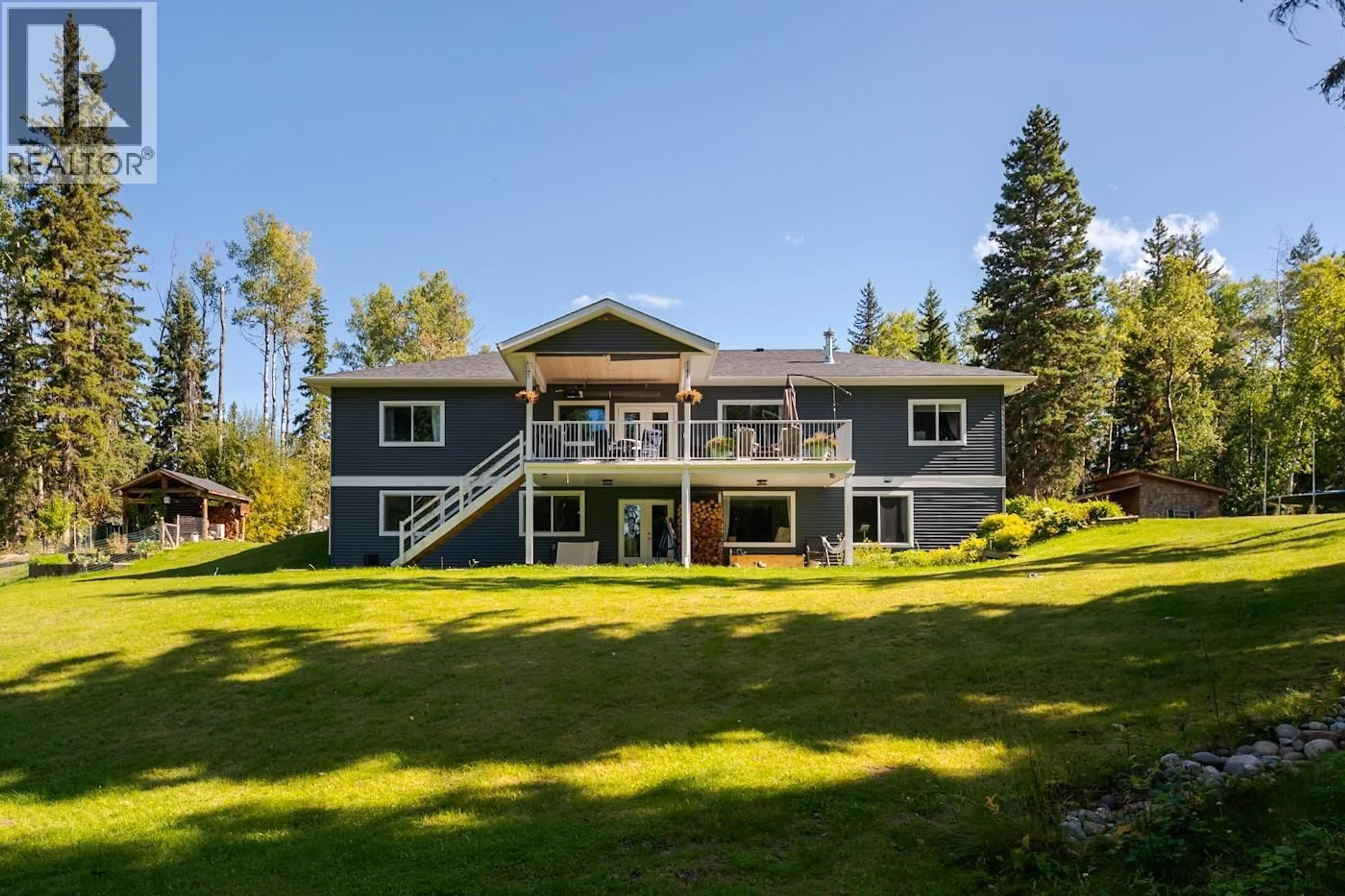 A pic from outside/outdoor area/front of a property/back of a property/a pic from drone, water/lake/river/ocean view for 8615 ROBSON ROAD, Prince George British Columbia V2N6B3