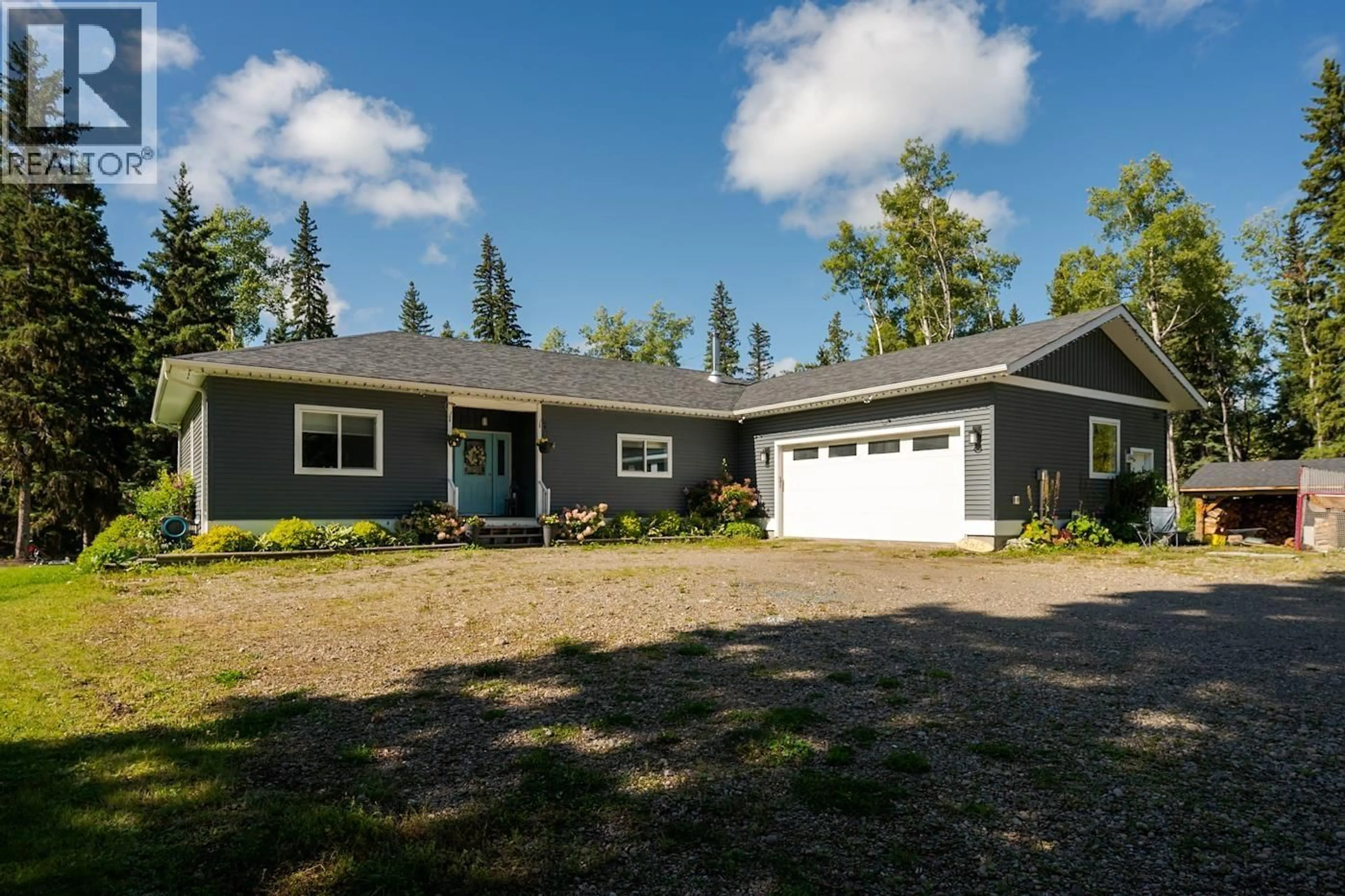 Home with vinyl exterior material, street for 8615 ROBSON ROAD, Prince George British Columbia V2N6B3
