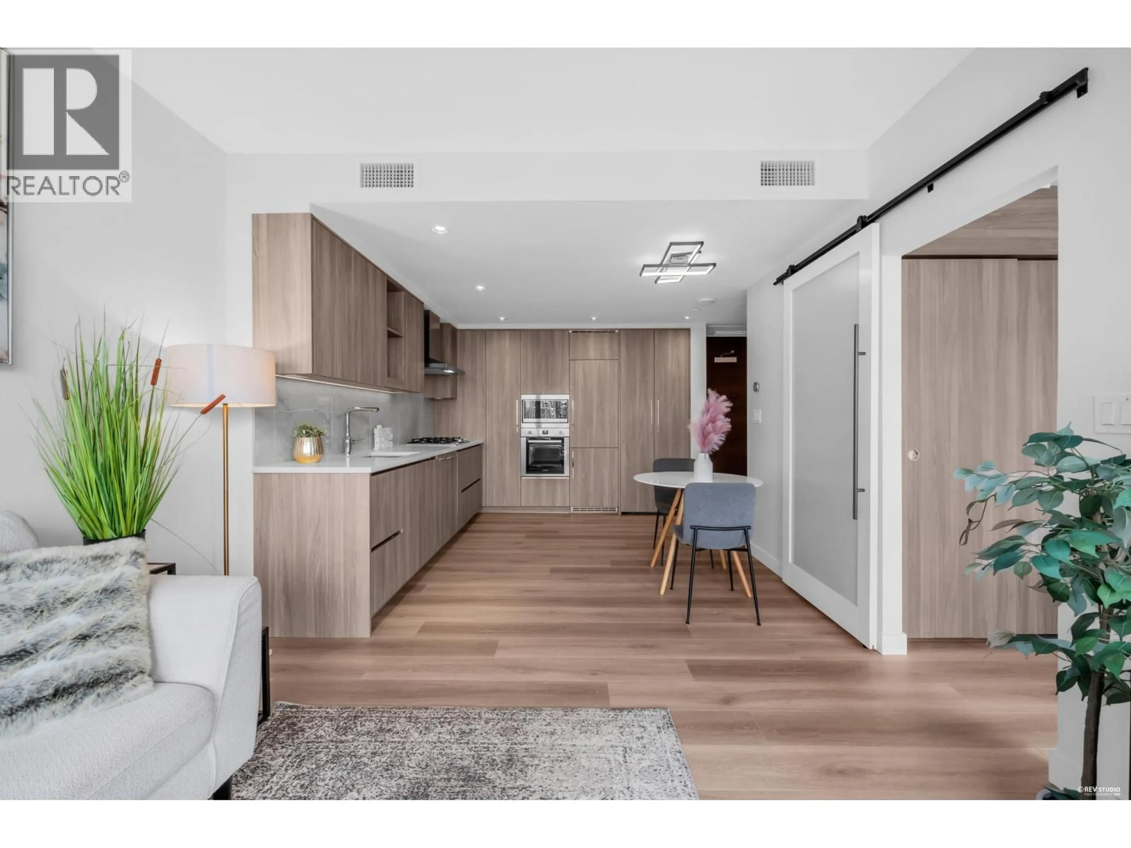 Open concept kitchen, wood/laminate floor for 1003 - 4730 LOUGHEED HIGHWAY, Burnaby British Columbia V5C0M9