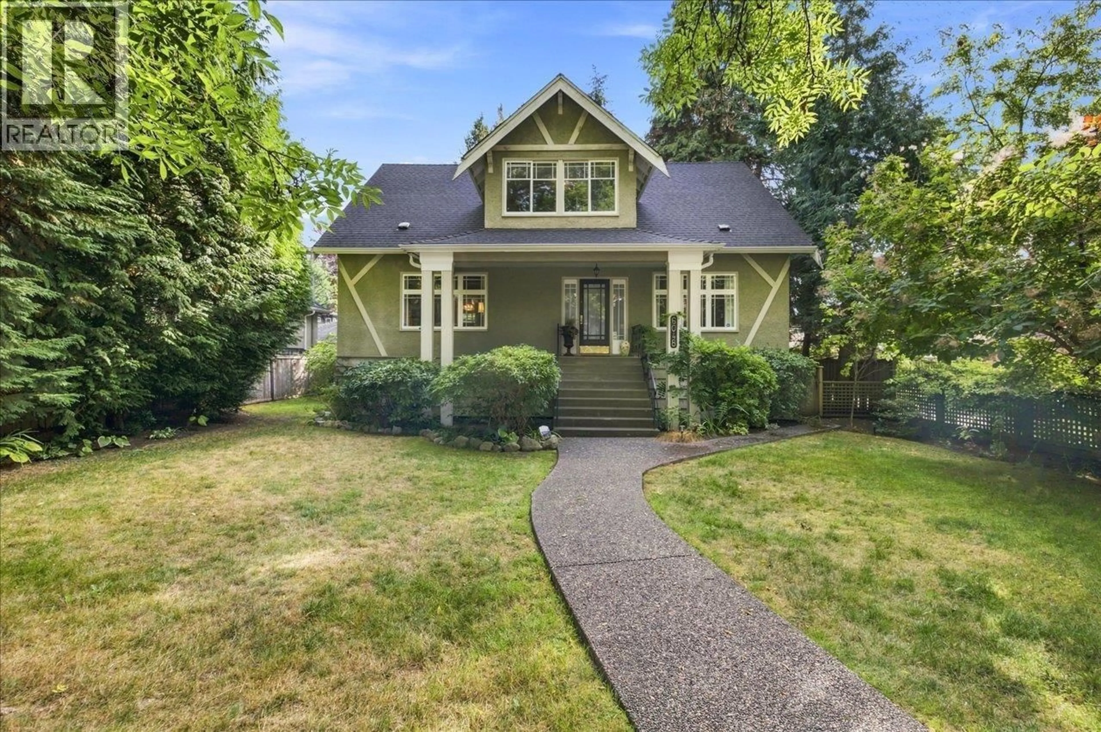 Home with vinyl exterior material, street for 6048 ELM STREET, Vancouver British Columbia V6N1A9