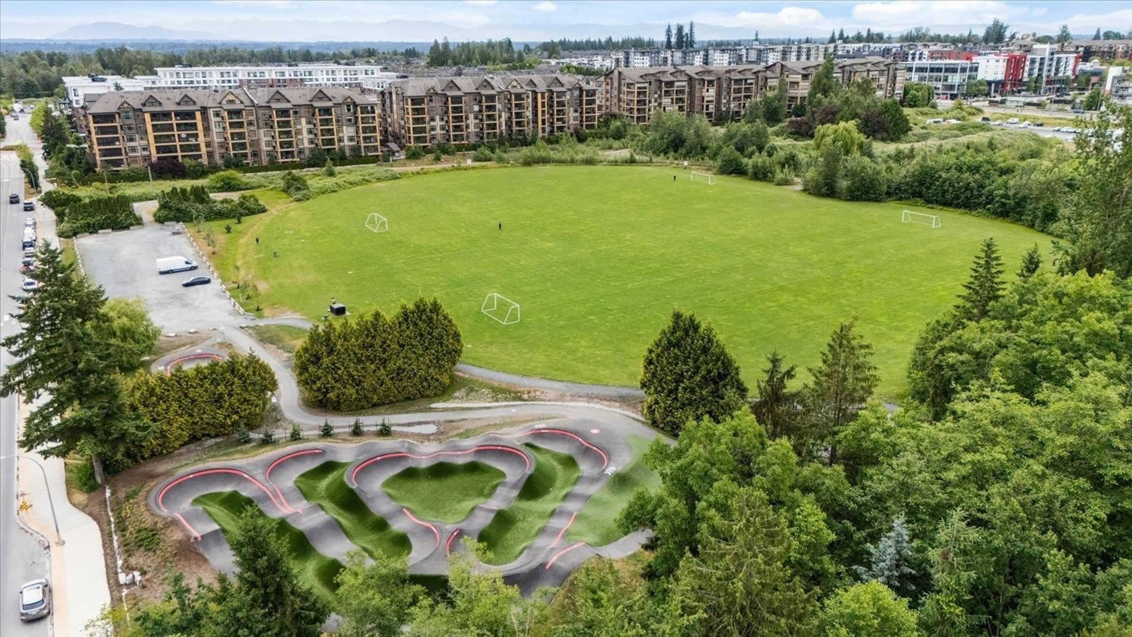 A pic from outside/outdoor area/front of a property/back of a property/a pic from drone, unknown for 401 - 8157 207 STREET, Langley British Columbia V2Y0V4