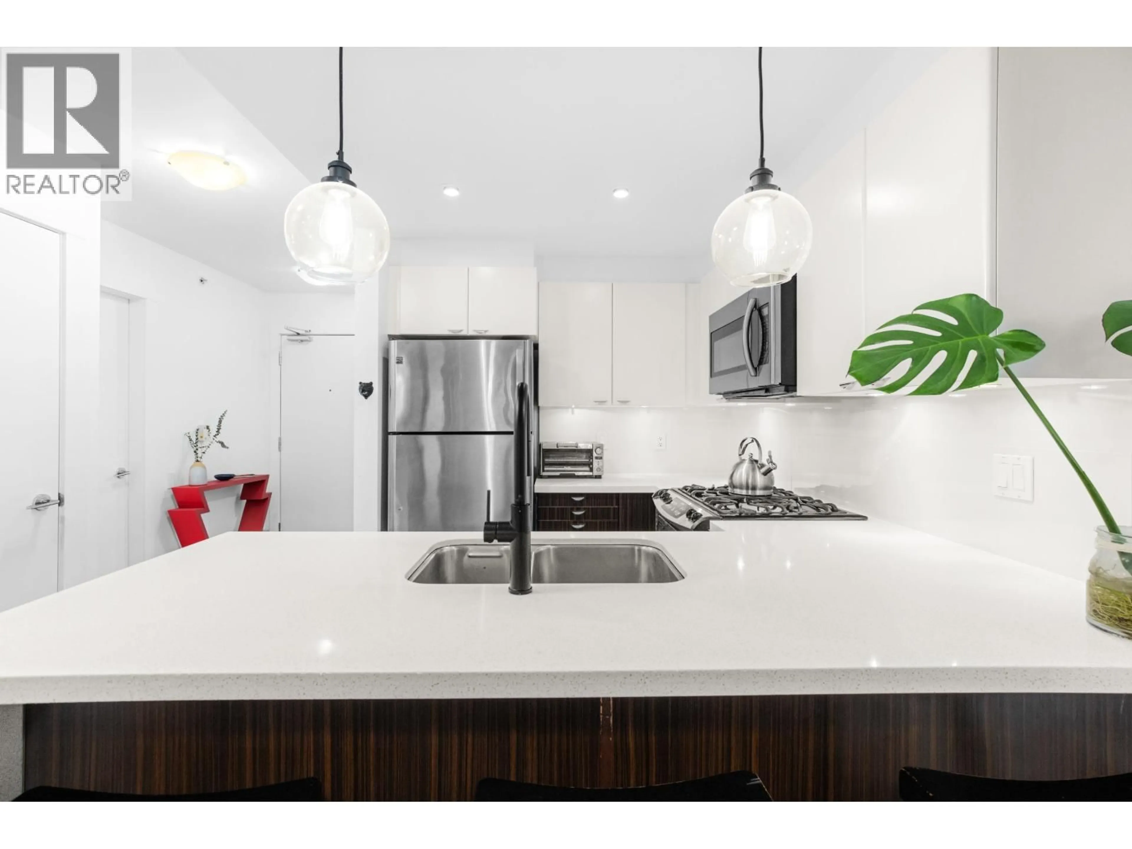 Contemporary kitchen, ceramic/tile floor for 603 - 160 3RD STREET, North Vancouver British Columbia V7M0A9