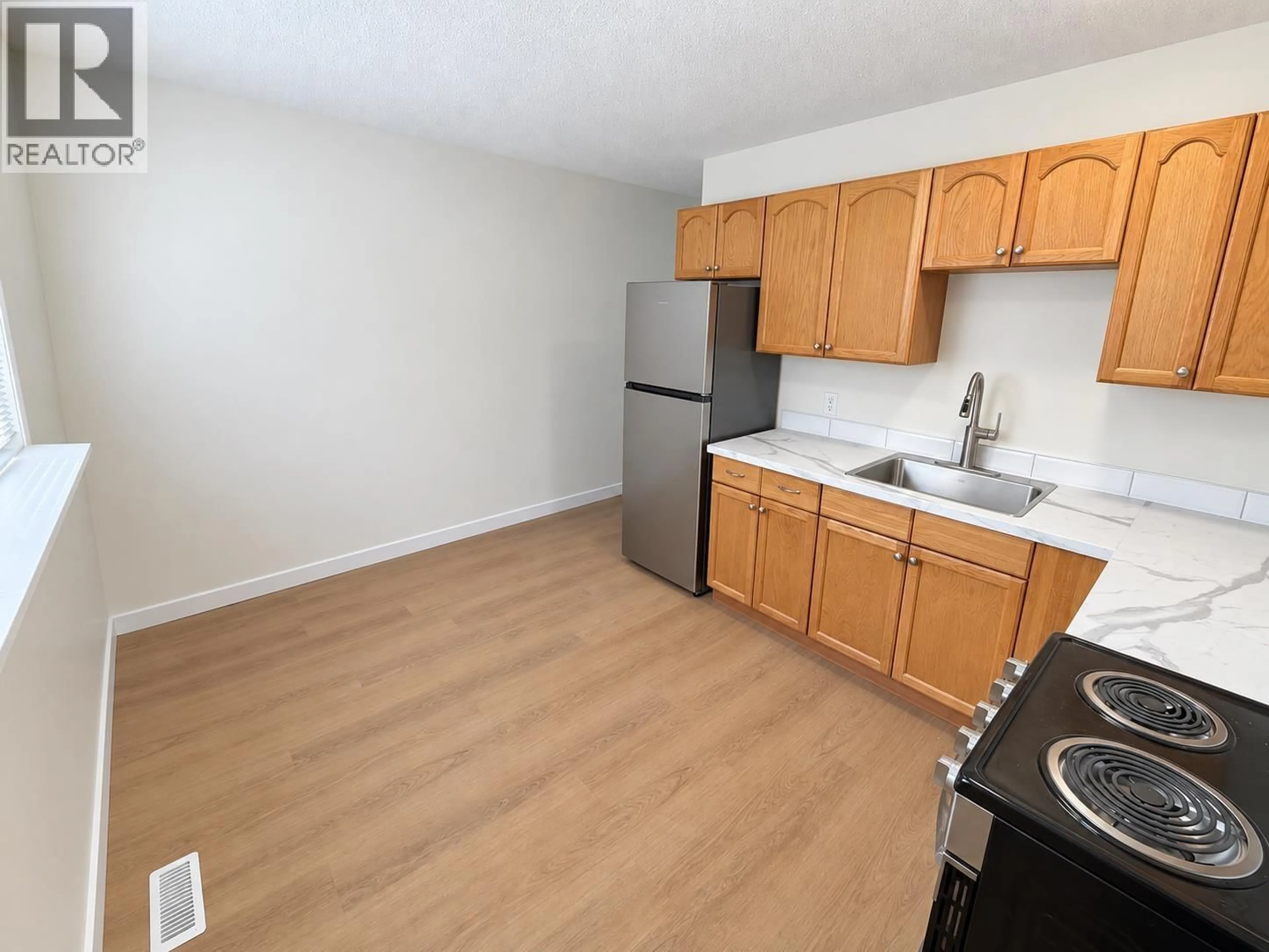 Standard kitchen, wood/laminate floor for H107 - 1900 STRATHCONA AVENUE, Prince George British Columbia V2L2V9