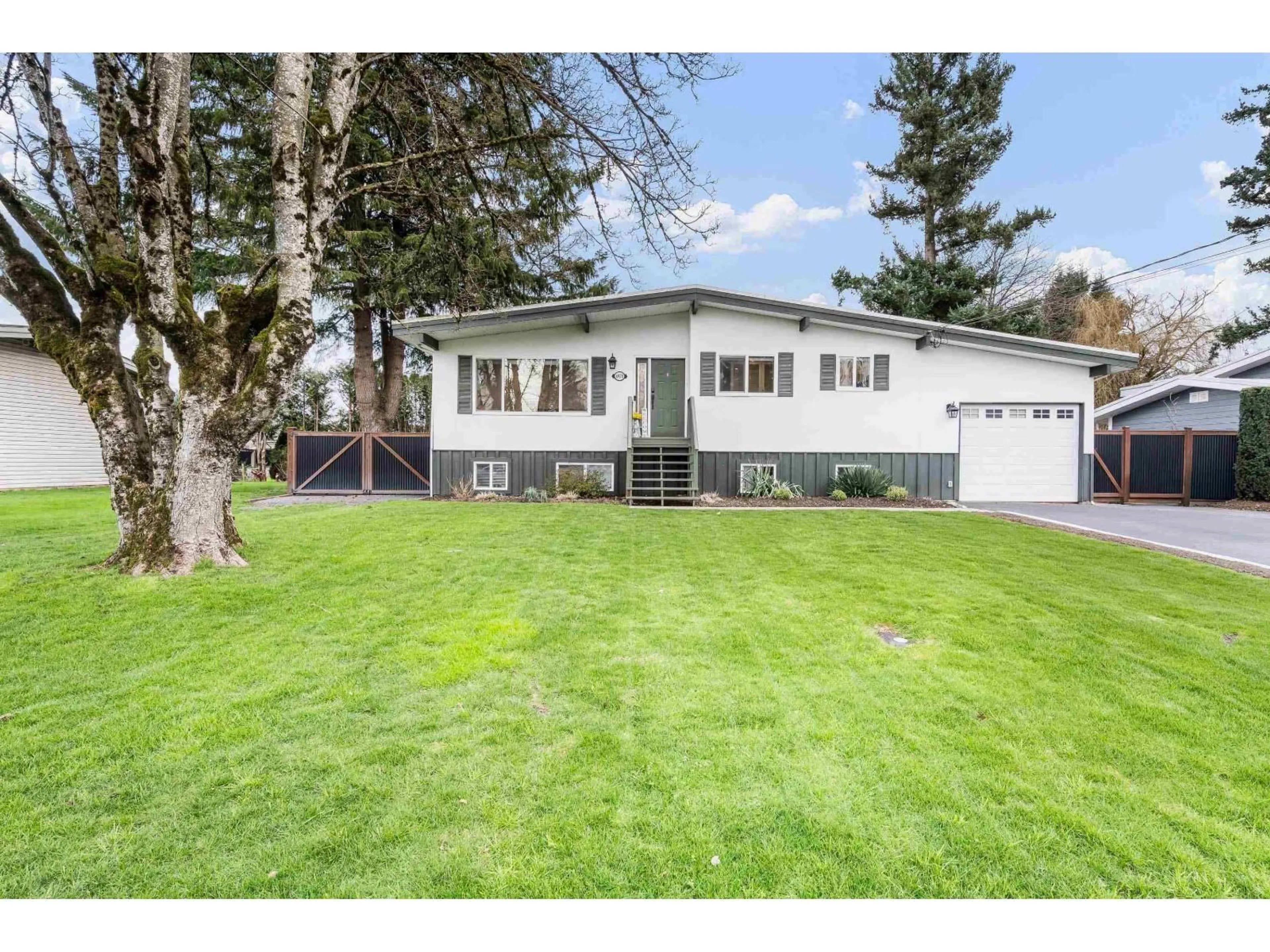 Home with vinyl exterior material, street for 6970 CENTENNIAL DRIVE, Chilliwack British Columbia V2R1J7