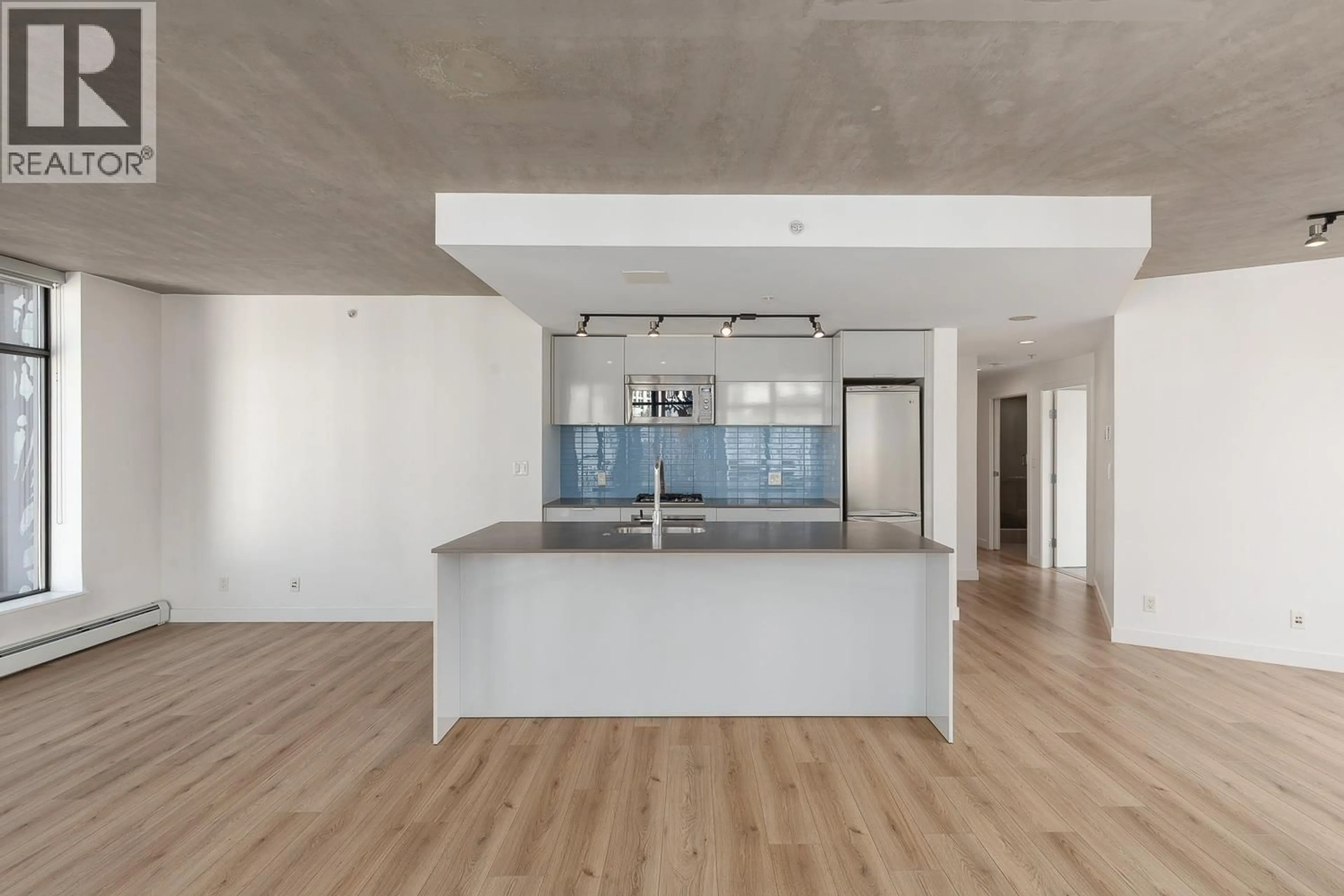Open concept kitchen, unknown for 810 - 128 CORDOVA STREET, Vancouver British Columbia V6B0E6