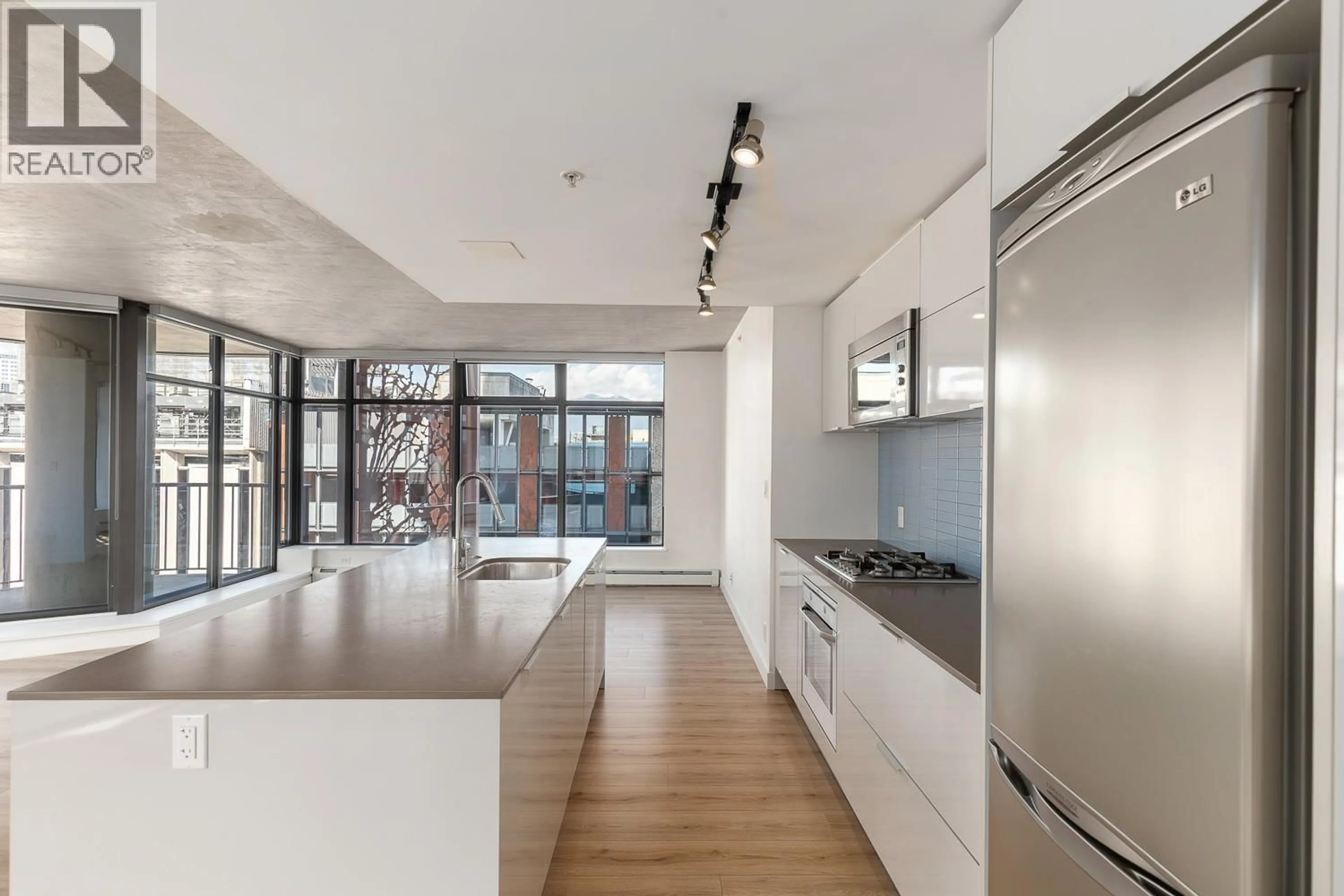 Open concept kitchen, unknown for 810 - 128 CORDOVA STREET, Vancouver British Columbia V6B0E6
