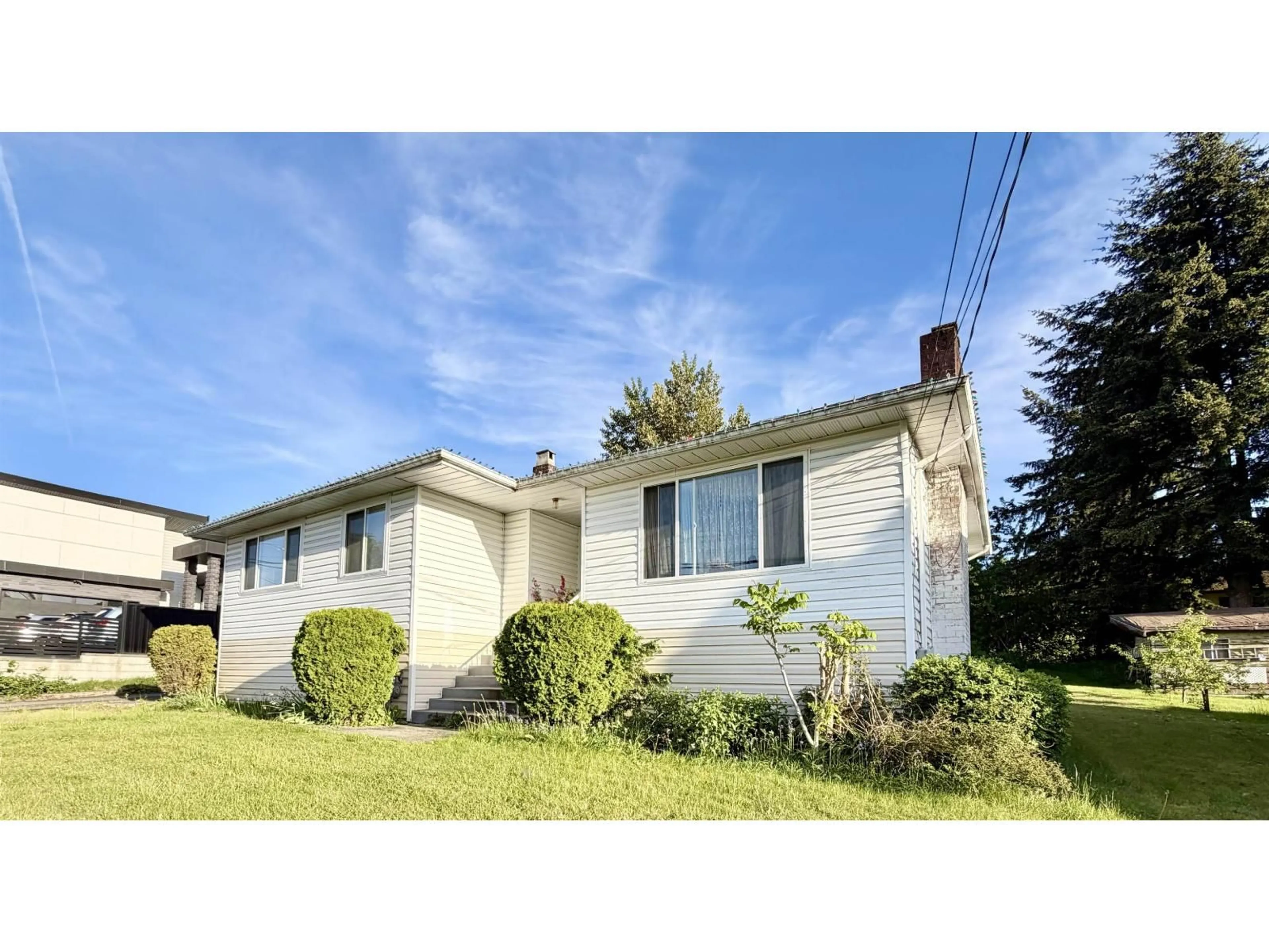Home with vinyl exterior material, street for 13688 113 AVENUE, Surrey British Columbia V3R2J1
