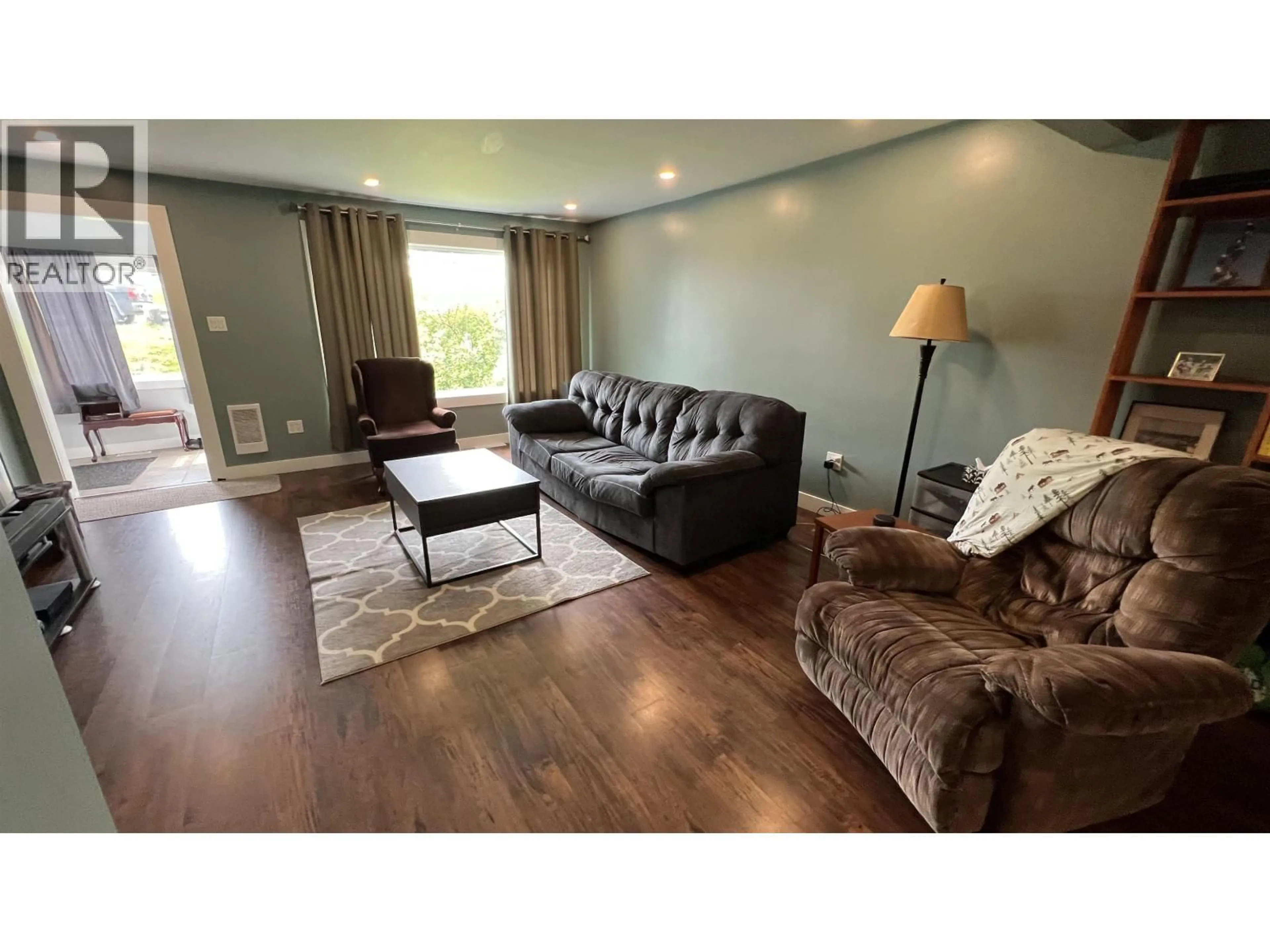 Living room with furniture, wood/laminate floor for 710 8TH AVENUE, Prince Rupert British Columbia V8J2M9