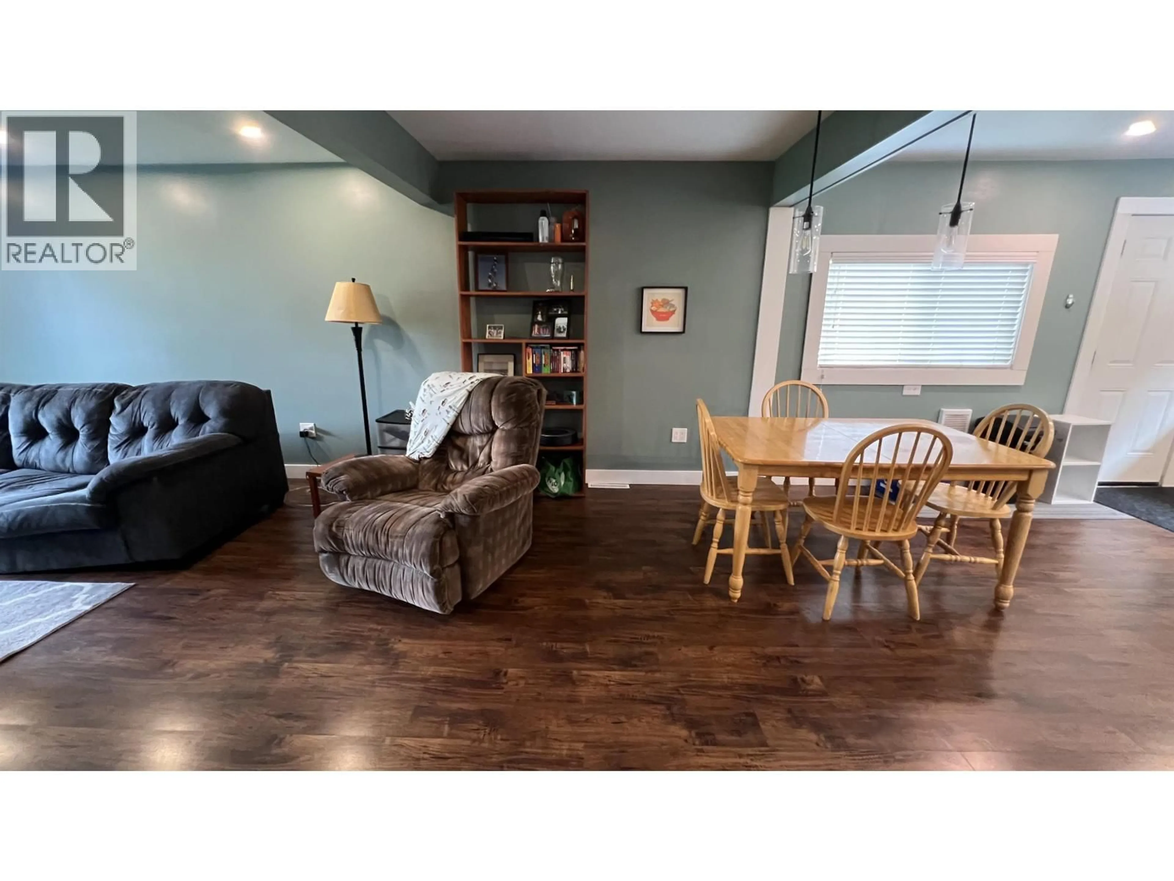 Living room with furniture, wood/laminate floor for 710 8TH AVENUE, Prince Rupert British Columbia V8J2M9