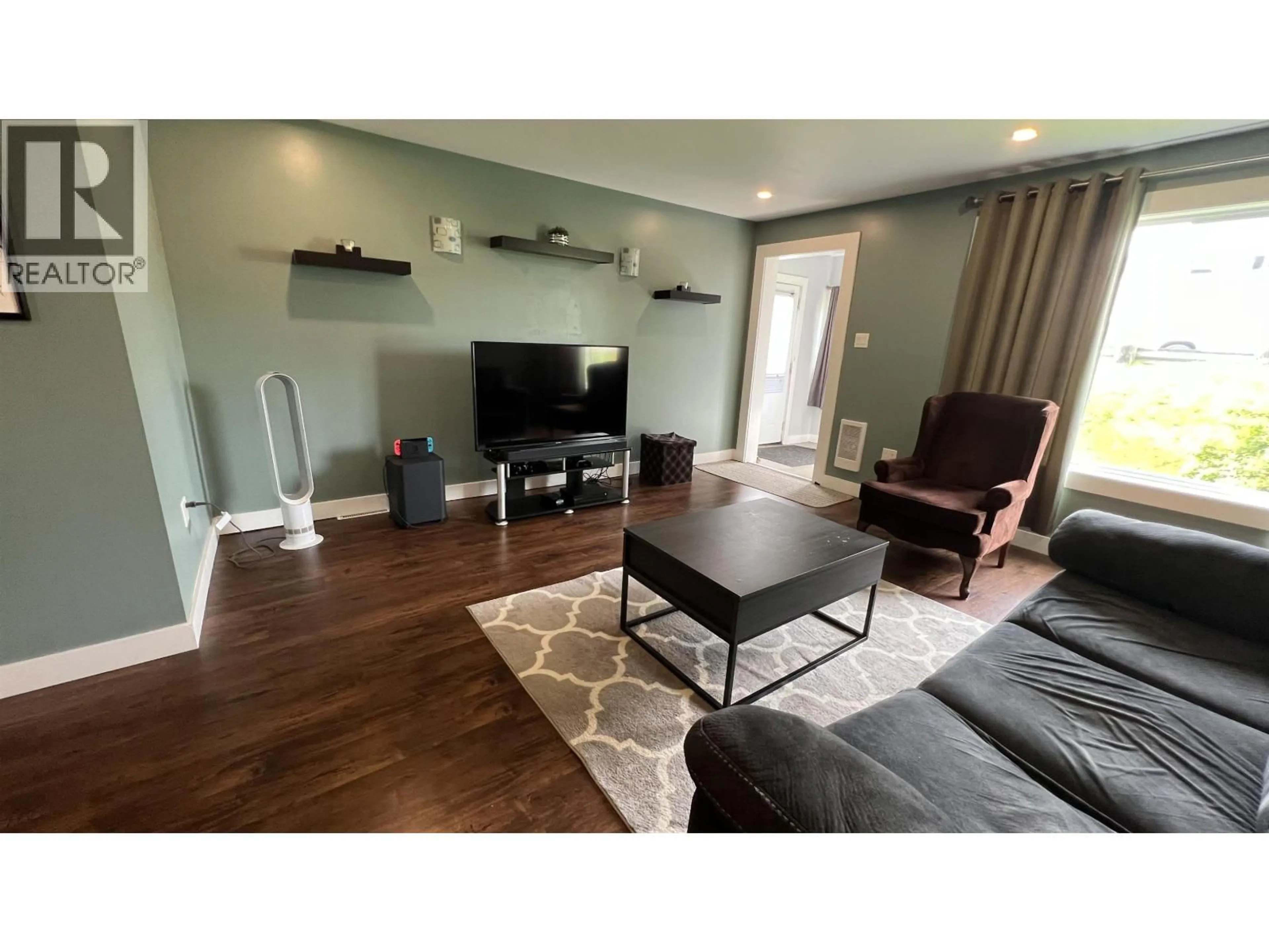 Living room with furniture, wood/laminate floor for 710 8TH AVENUE, Prince Rupert British Columbia V8J2M9