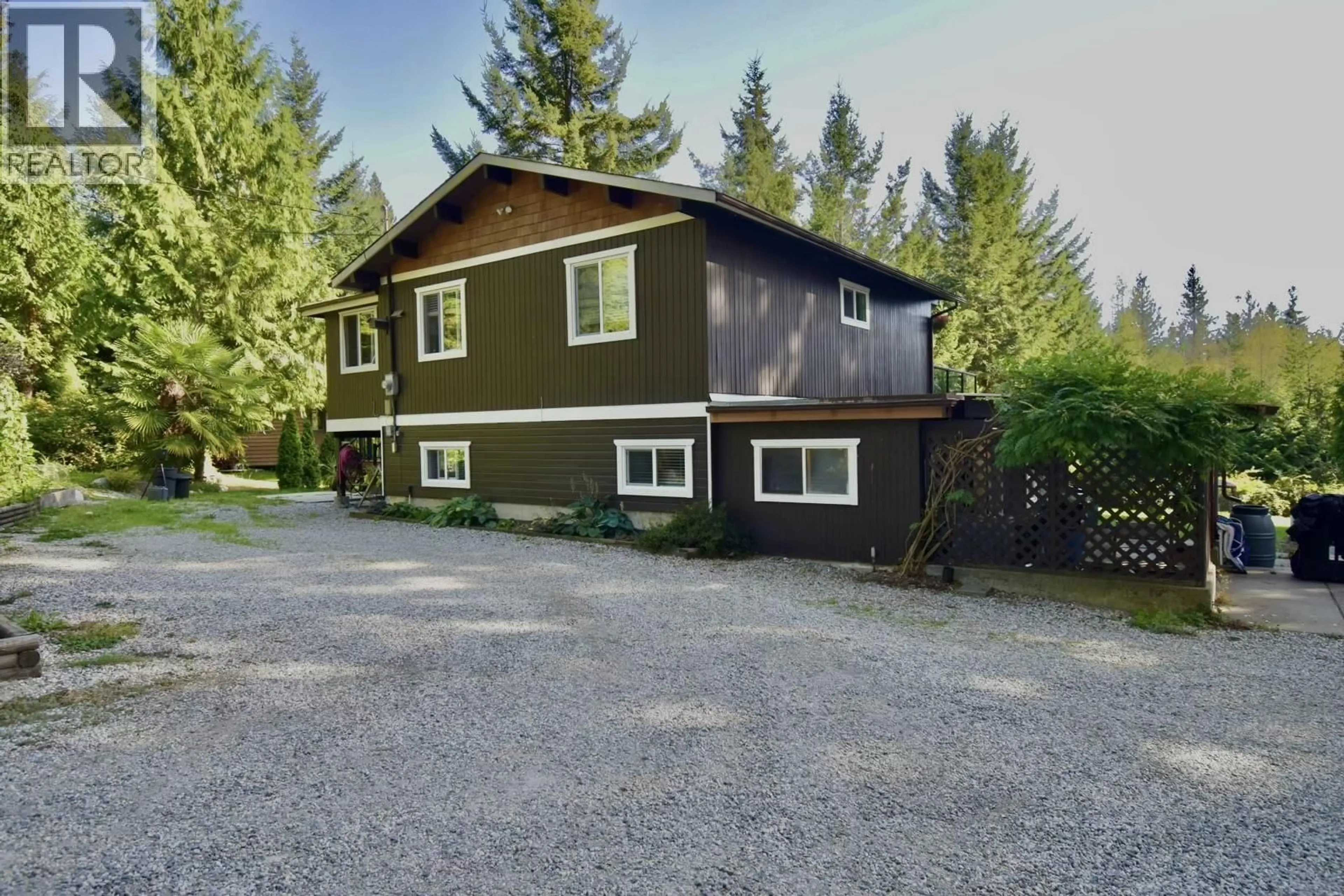 Home with vinyl exterior material, street for 2703 ROBINSON ROAD, Roberts Creek British Columbia V0N2W4