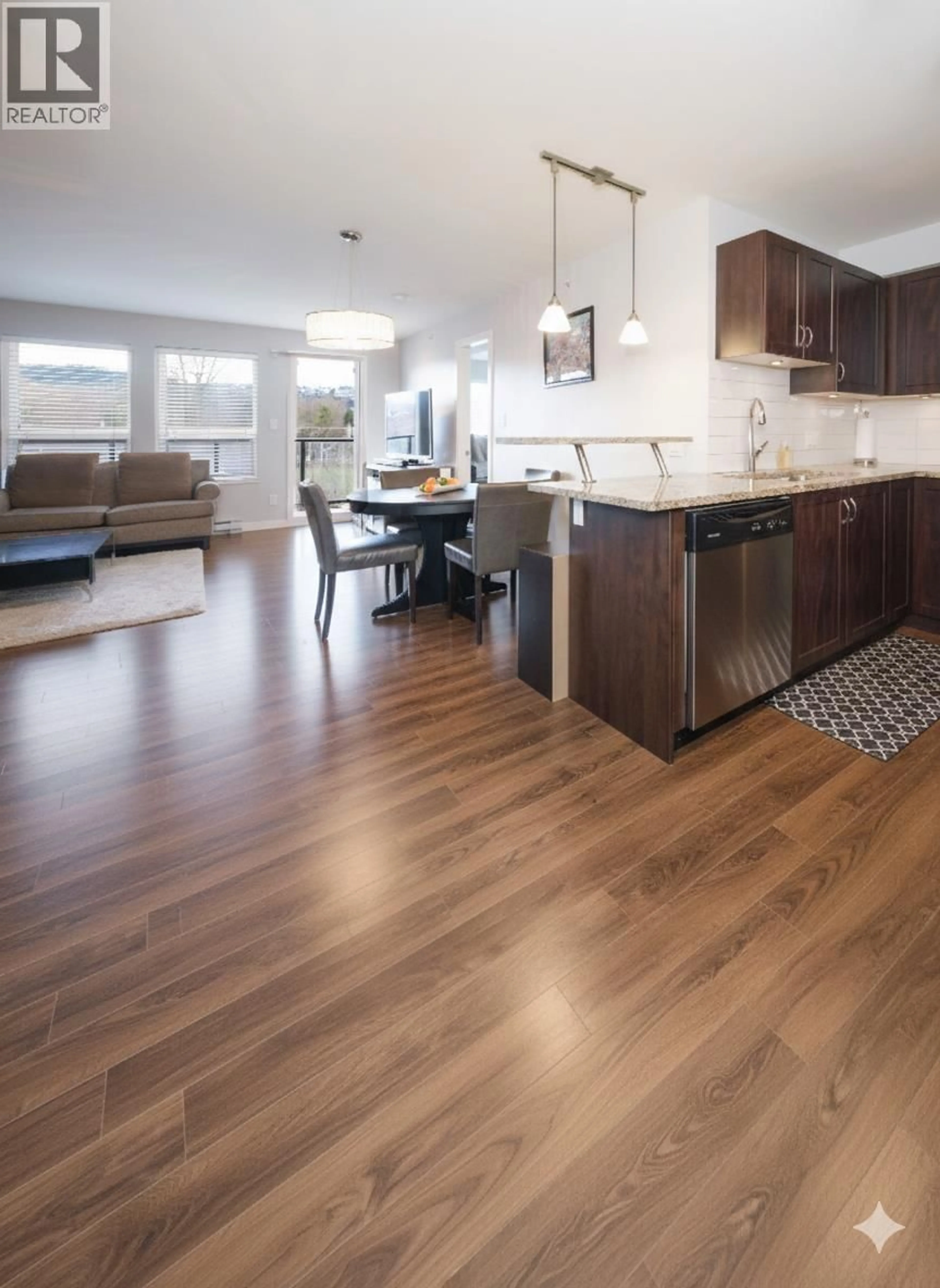 Open concept kitchen, wood/laminate floor for 306 - 2191 SHAUGHNESSY STREET, Port Coquitlam British Columbia V3C3C7
