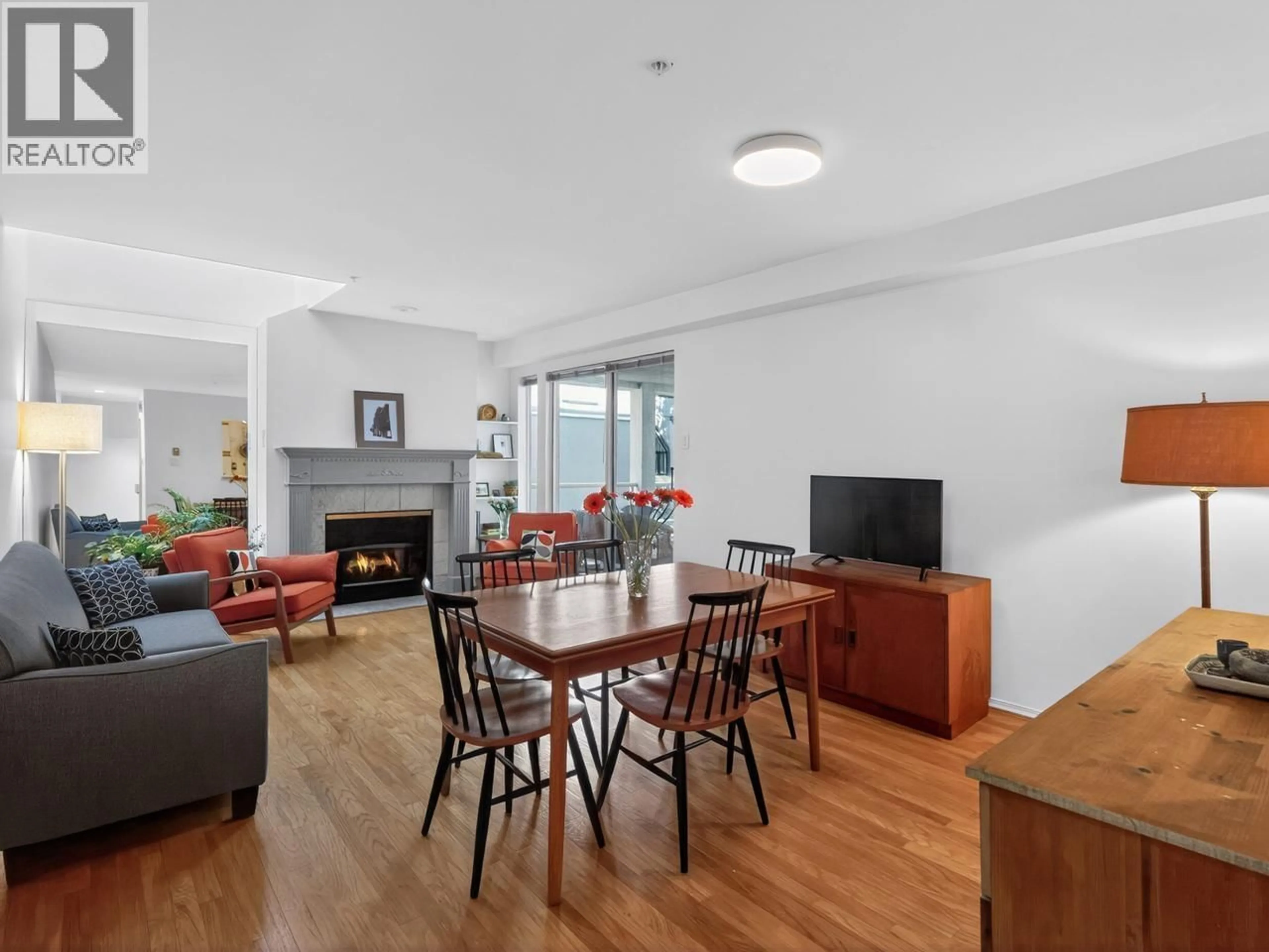 Living room with furniture, wood/laminate floor for 2175 3RD AVENUE, Vancouver British Columbia V6K1L2