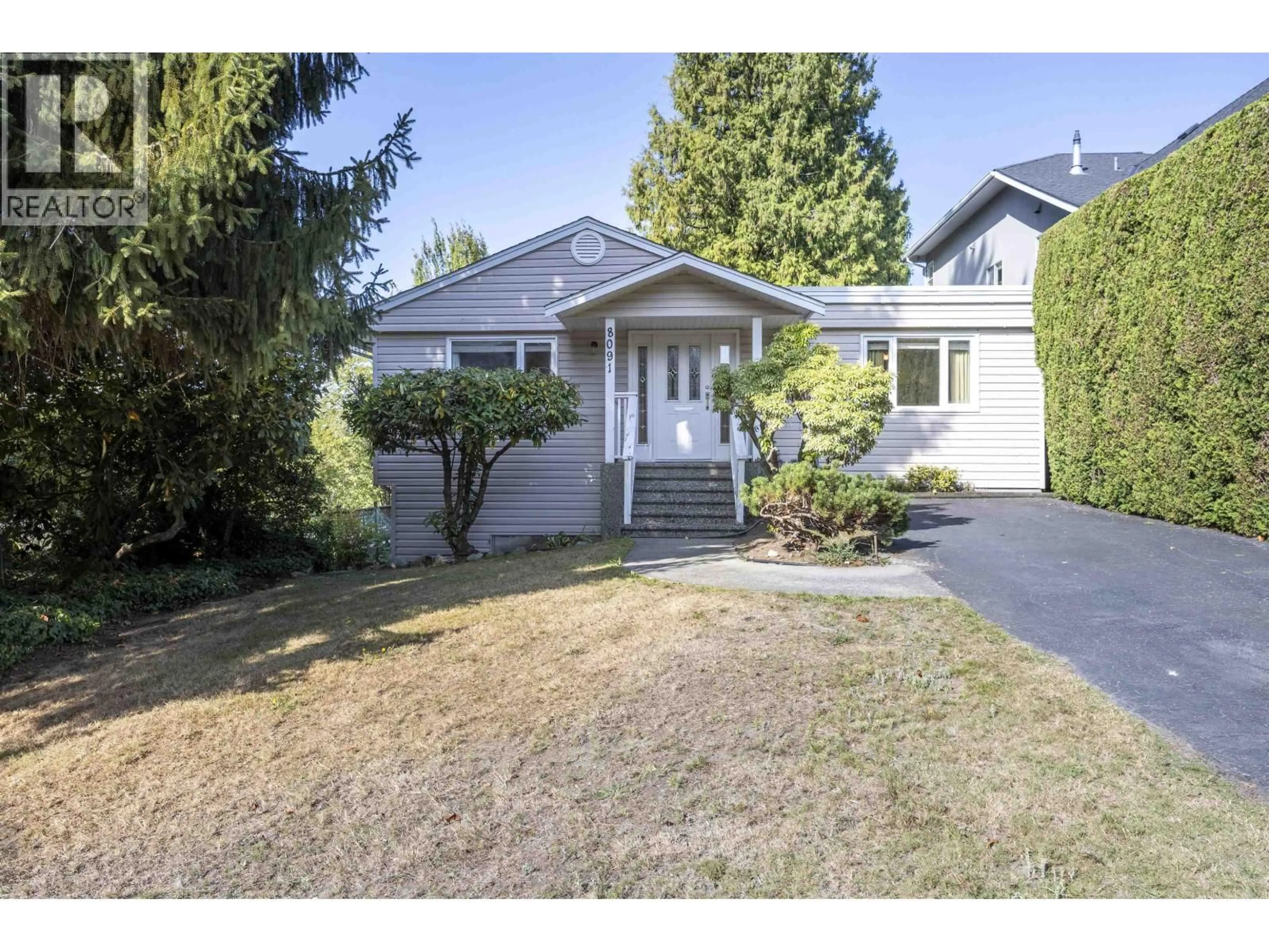 Home with vinyl exterior material, street for 8091 BRADLEY AVENUE, Burnaby British Columbia V5J3T9