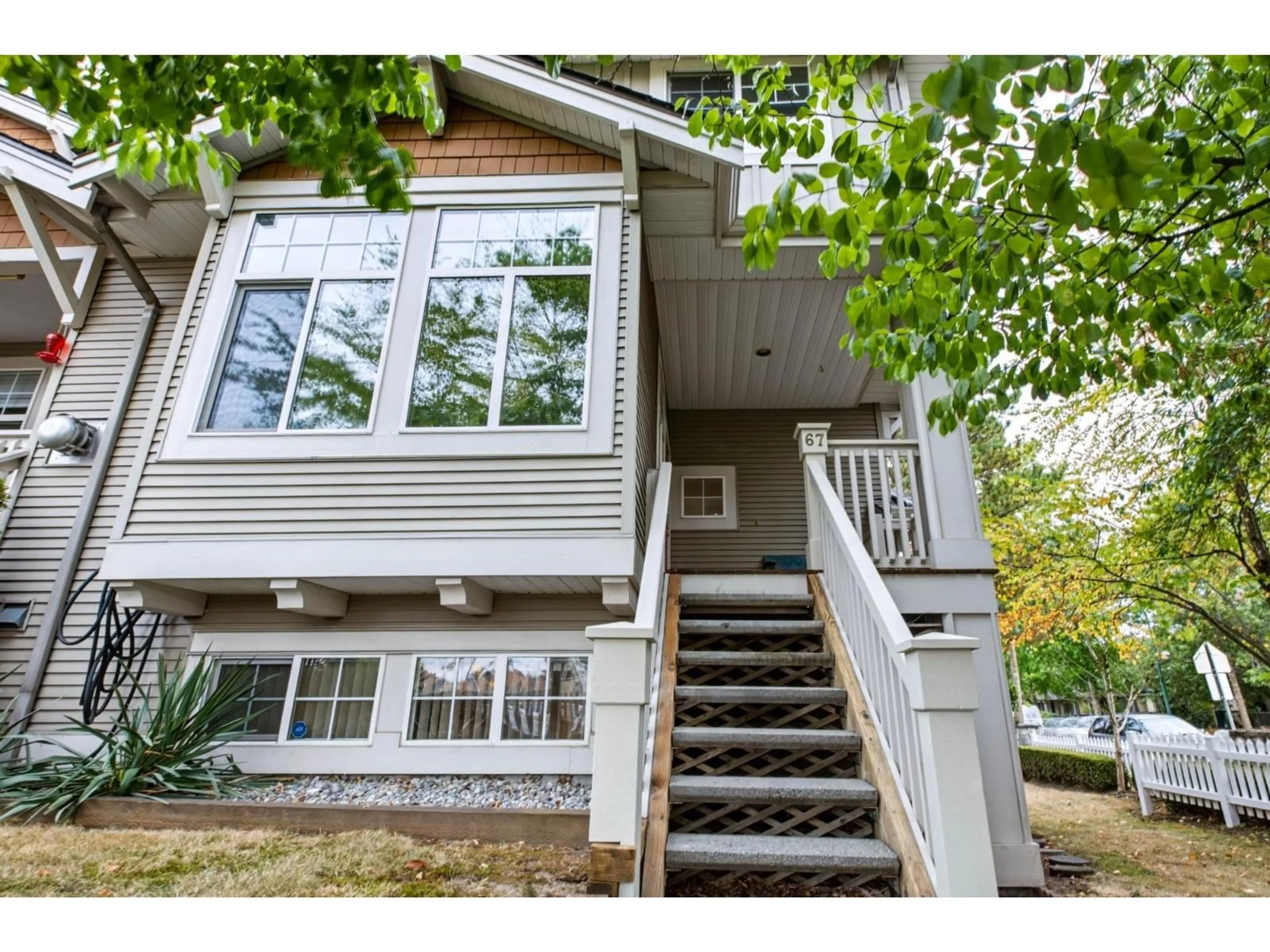 Home with vinyl exterior material, street for 67 - 14877 58 AVENUE, Surrey British Columbia V3S8Y9