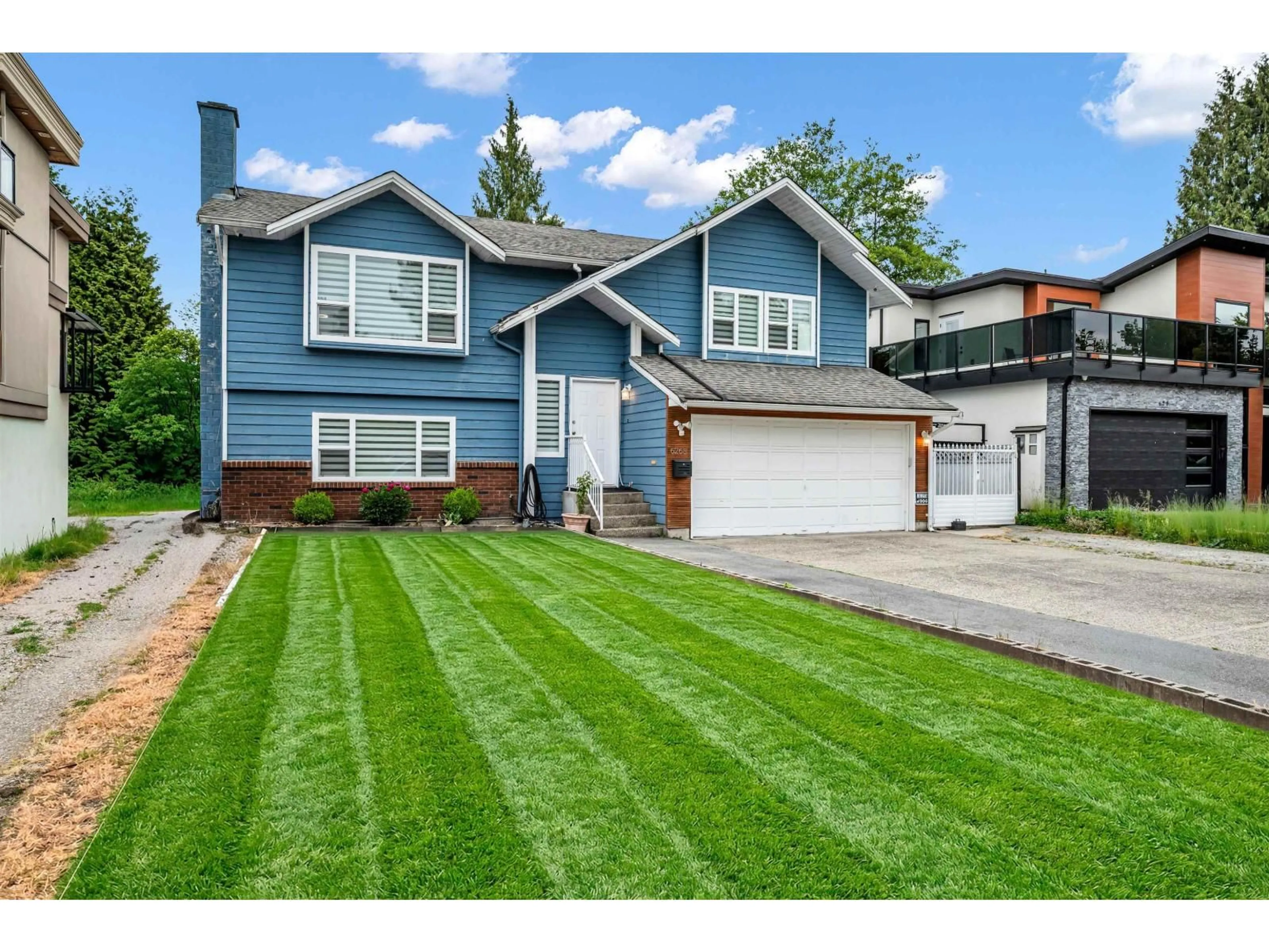 Home with vinyl exterior material, street for 6268 129 STREET, Surrey British Columbia V3X1S6