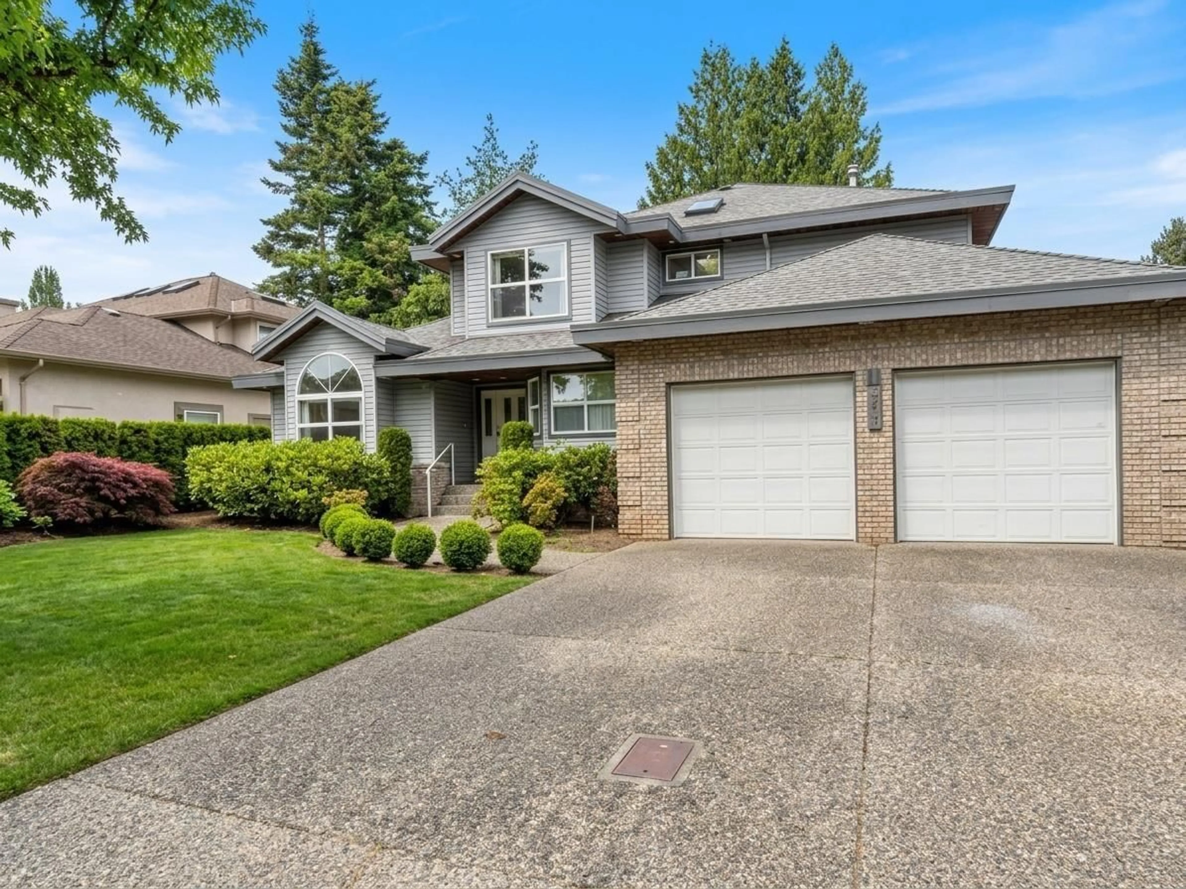 Home with vinyl exterior material, street for 4577 217 STREET, Langley British Columbia V3A9B7