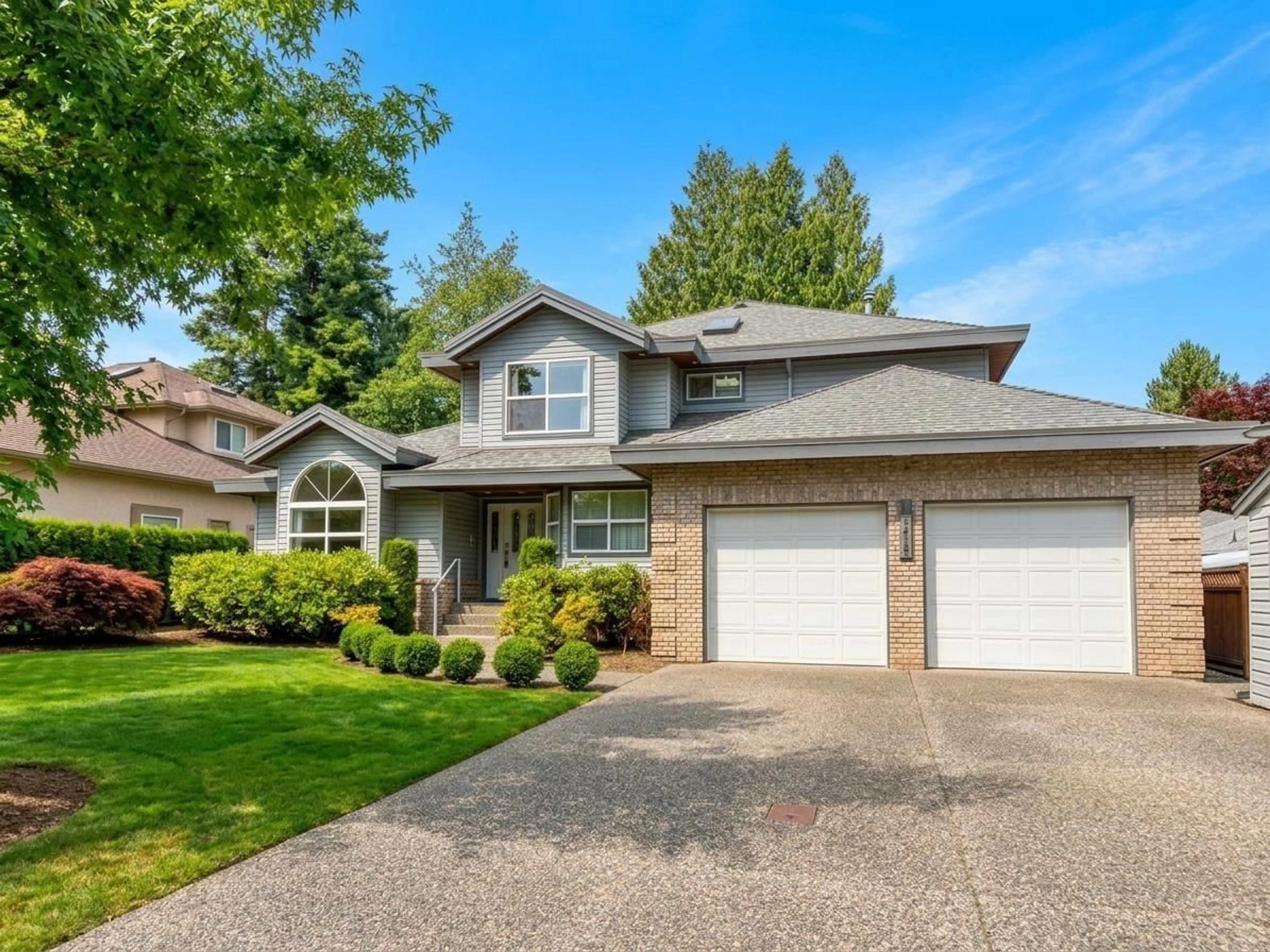 Home with vinyl exterior material, street for 4577 217 STREET, Langley British Columbia V3A9B7