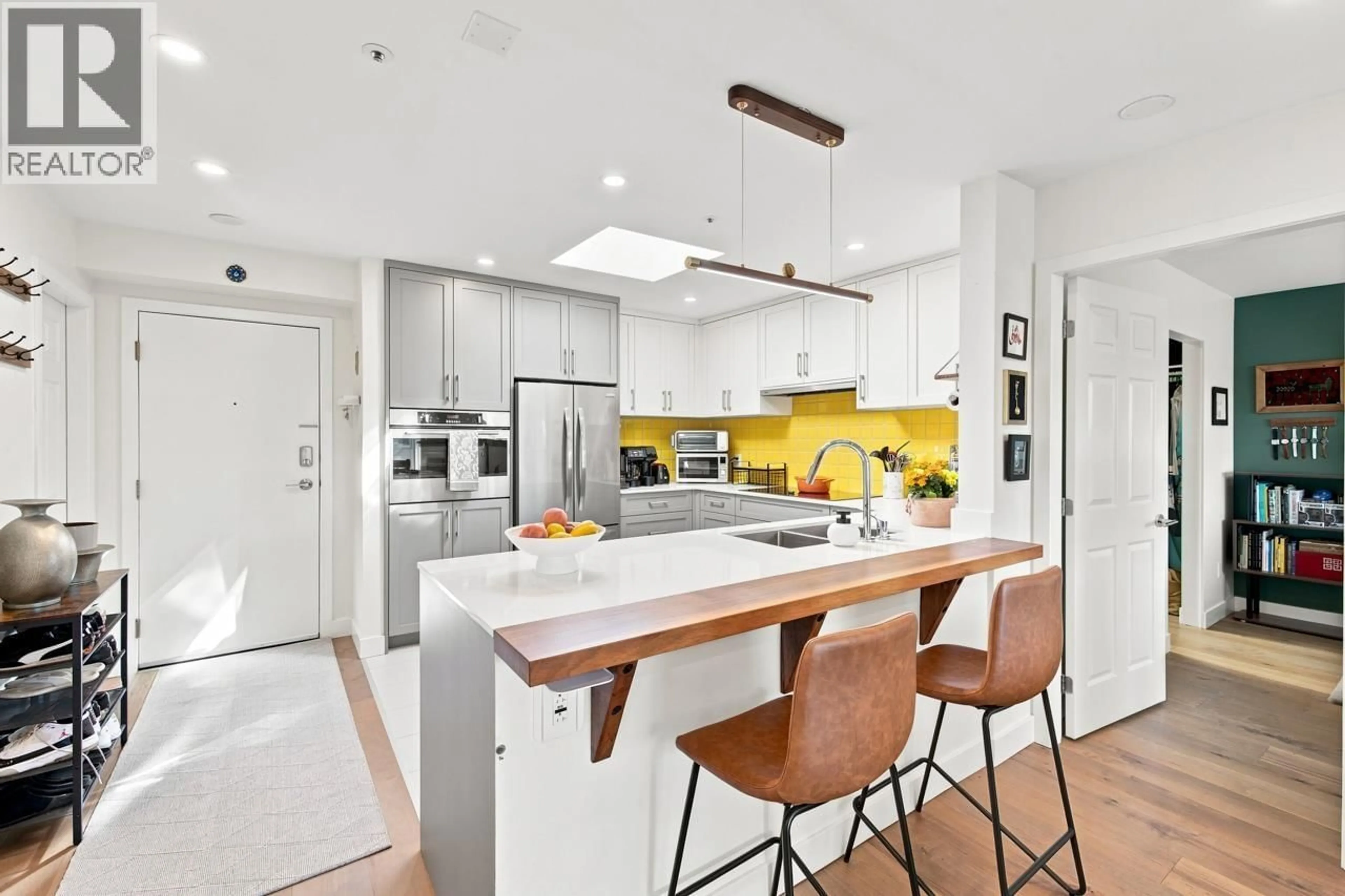Open concept kitchen, ceramic/tile floor for 412 - 3480 MAIN STREET, Vancouver British Columbia V5V3N2