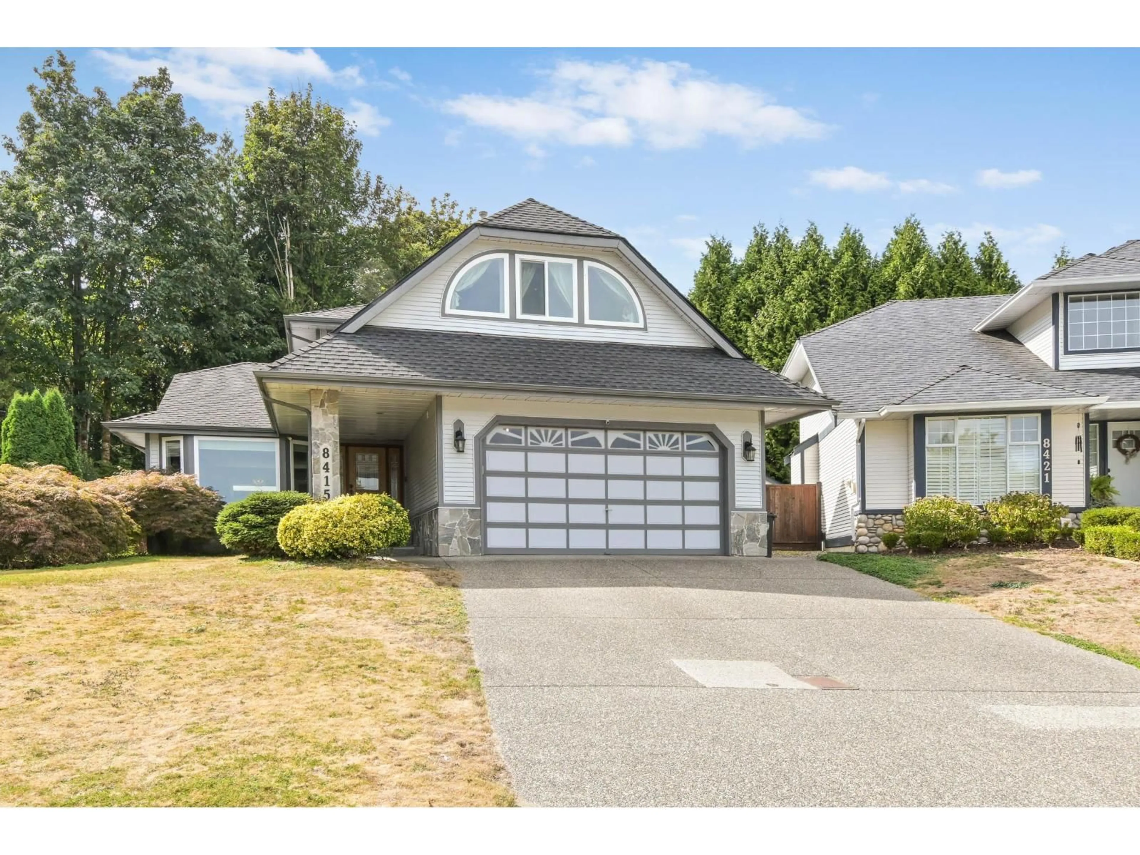 Home with vinyl exterior material, street for 8415 214 STREET, Langley British Columbia V1M2J2