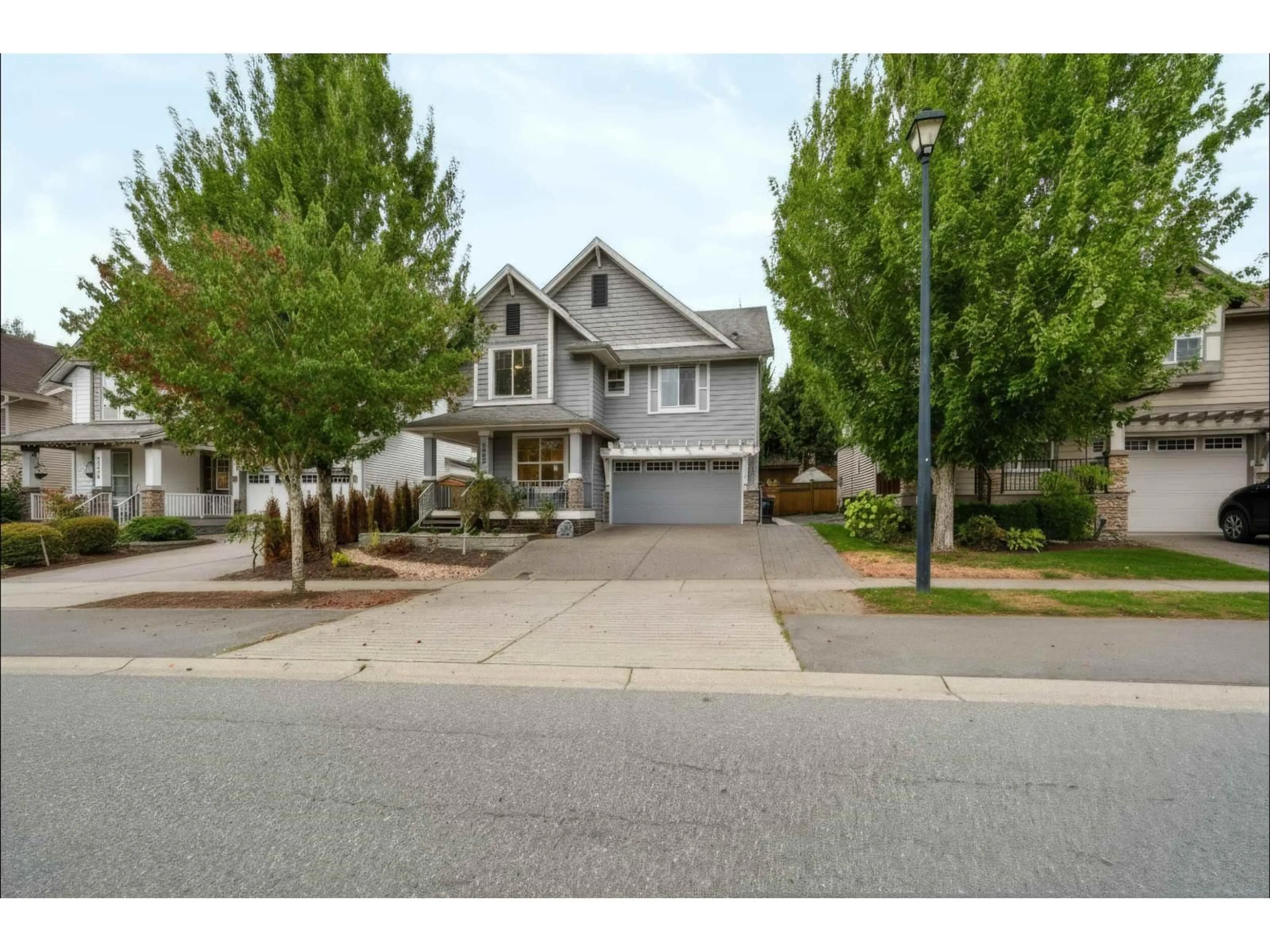 Home with vinyl exterior material, street for 2293 MERLOT BOULEVARD, Abbotsford British Columbia V4X0A6