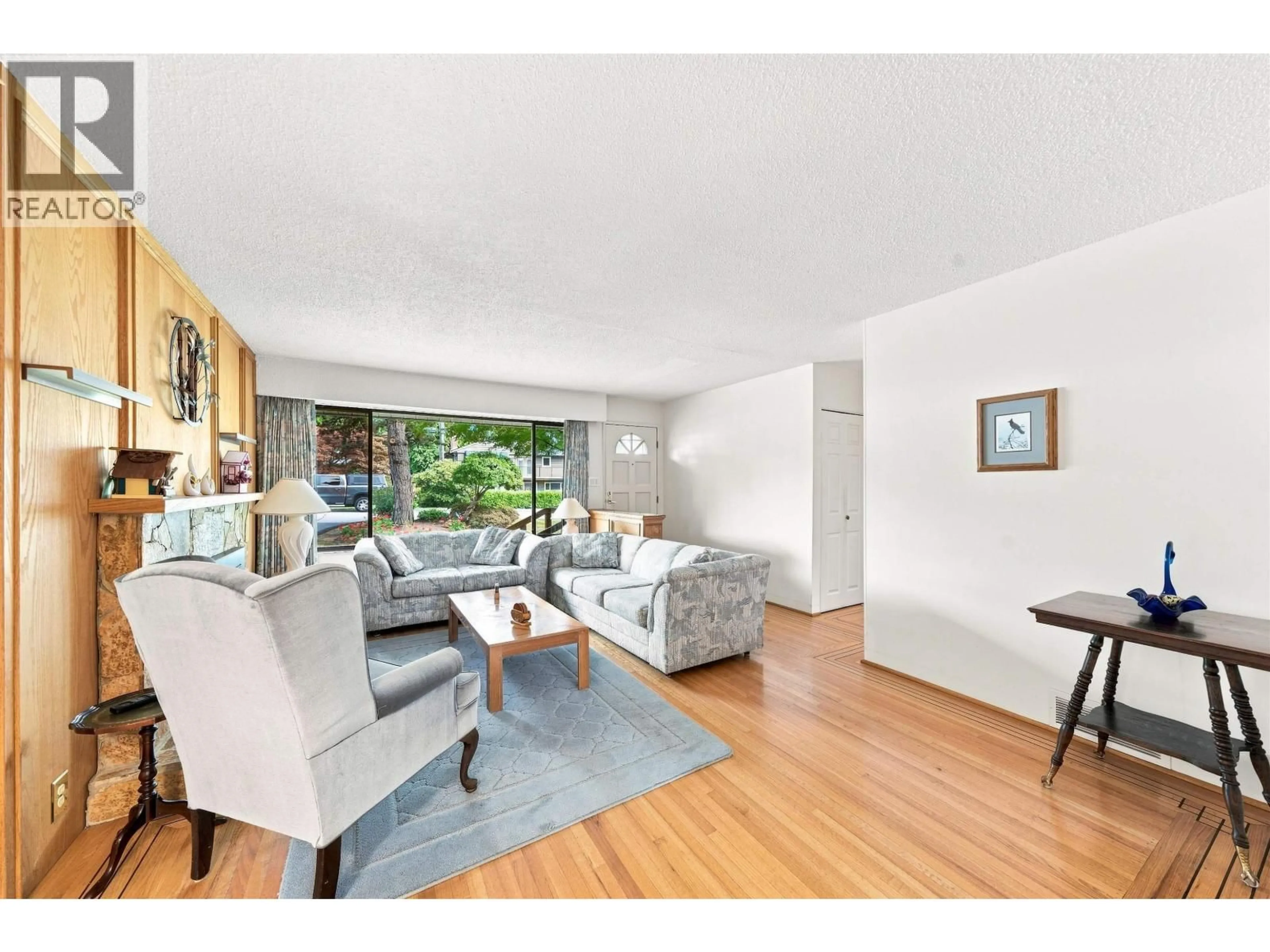 Living room with furniture, wood/laminate floor for 2161 FLORALYNN CRESCENT, North Vancouver British Columbia V7J2W3