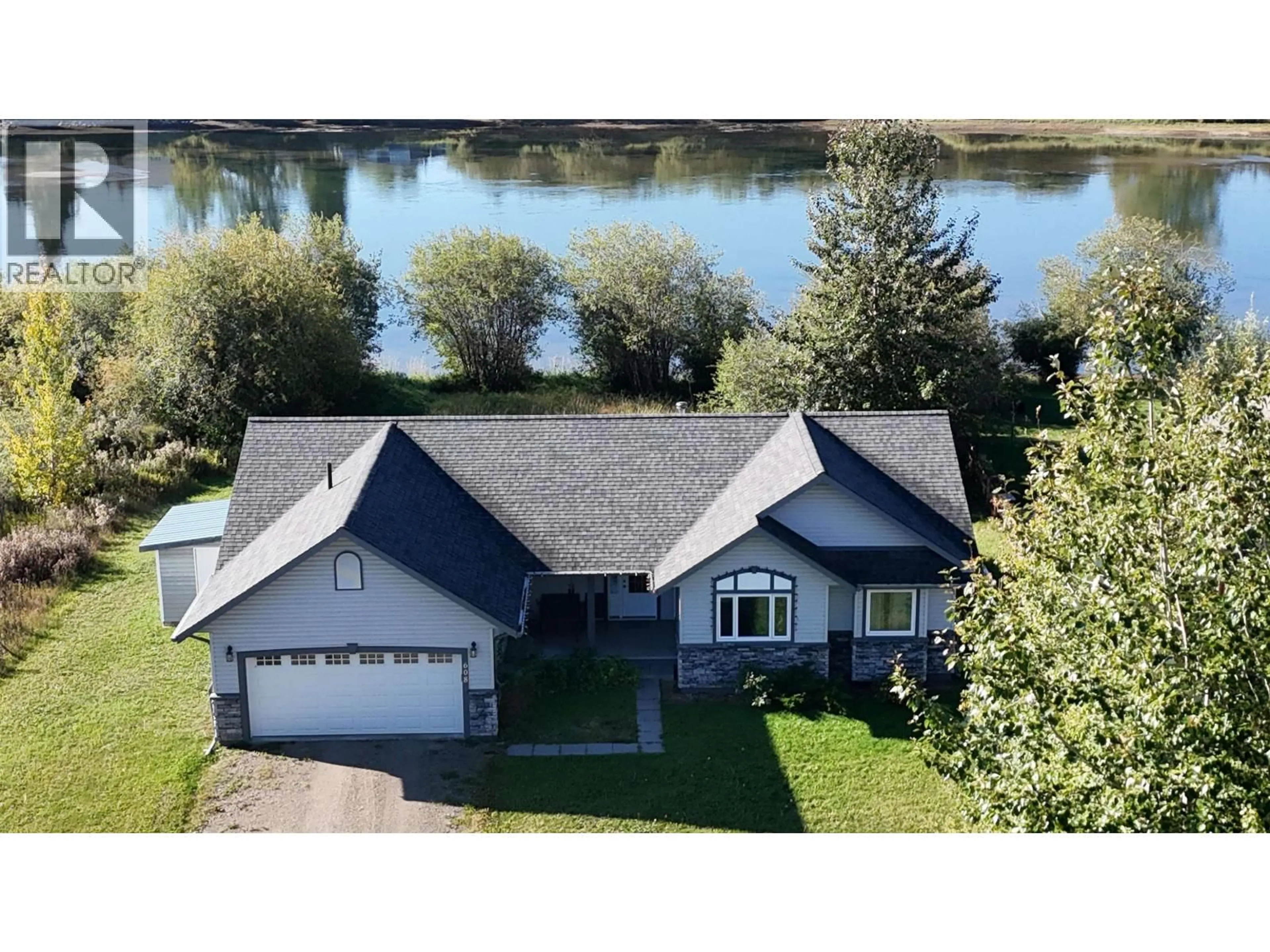 A pic from outside/outdoor area/front of a property/back of a property/a pic from drone, water/lake/river/ocean view for 608 REID DRIVE, Vanderhoof British Columbia V0J3A2